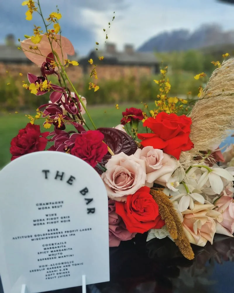 A floral arrangement with colourful flowers.