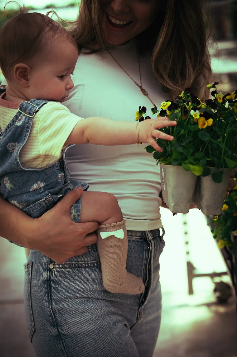 Mother and daughter portrait with floral backdrop Mother’s Day mini sessions
