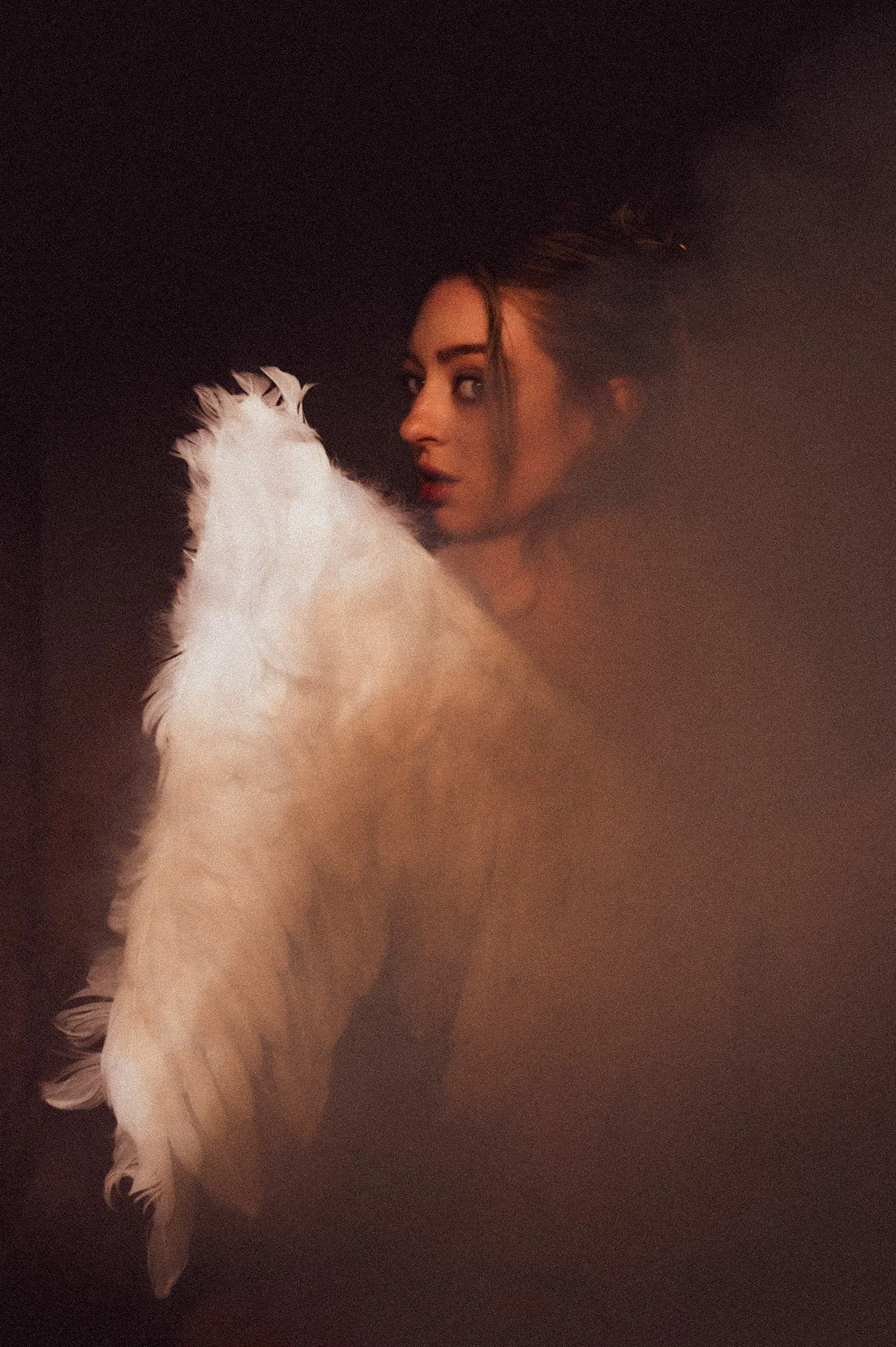 Angelic fine art photography, with ethereal wings. Moody portraits of women, and goddesses
