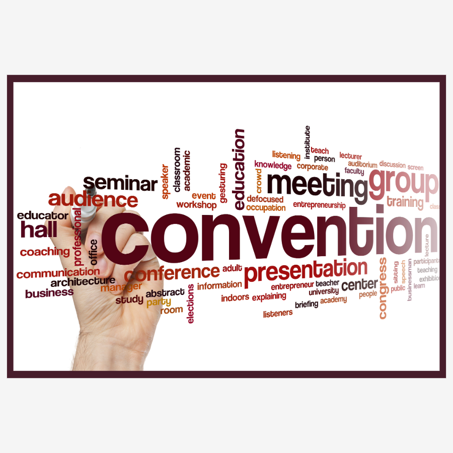 Word cloud with terms like 'convention', 'meeting', 'group', 'presentation', and related words about conferences and seminars. Hand appears to be writing or pointing at the words.