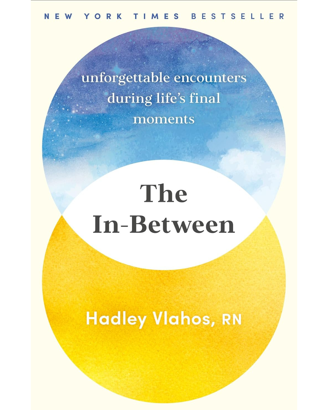 Book cover titled "The In-Between" by Hadley Vlahos, RN, featuring a two-tone circle design with a starry sky background in the upper circle and a yellow textured lower circle, with the subtitle "unforgettable encounters during life's final moments".