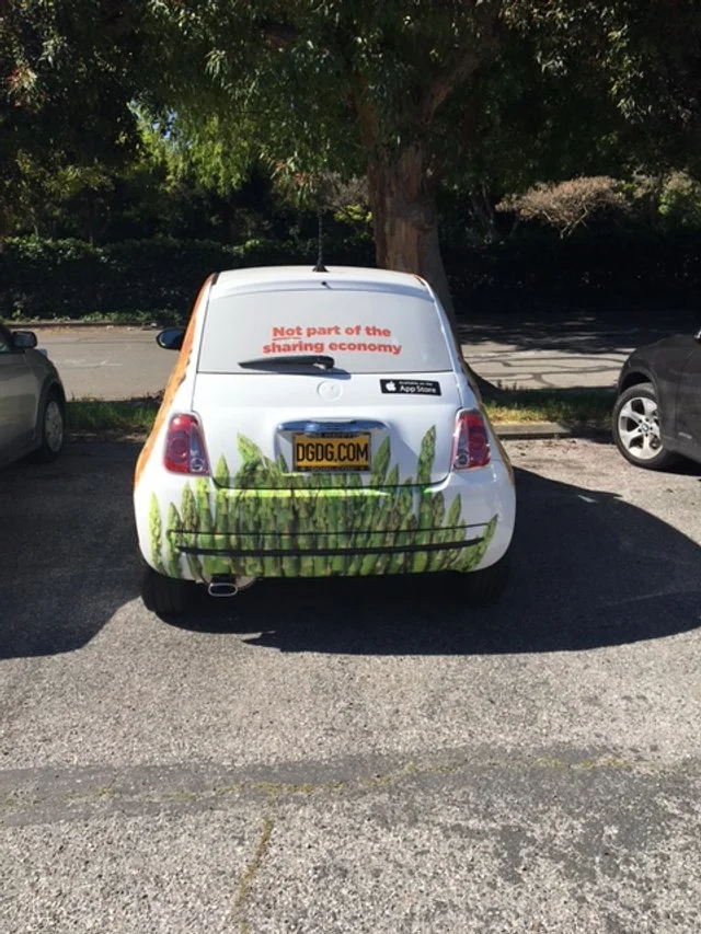 Full vehicle wrap for Zume Pizza delivery car with branded food graphics and messaging