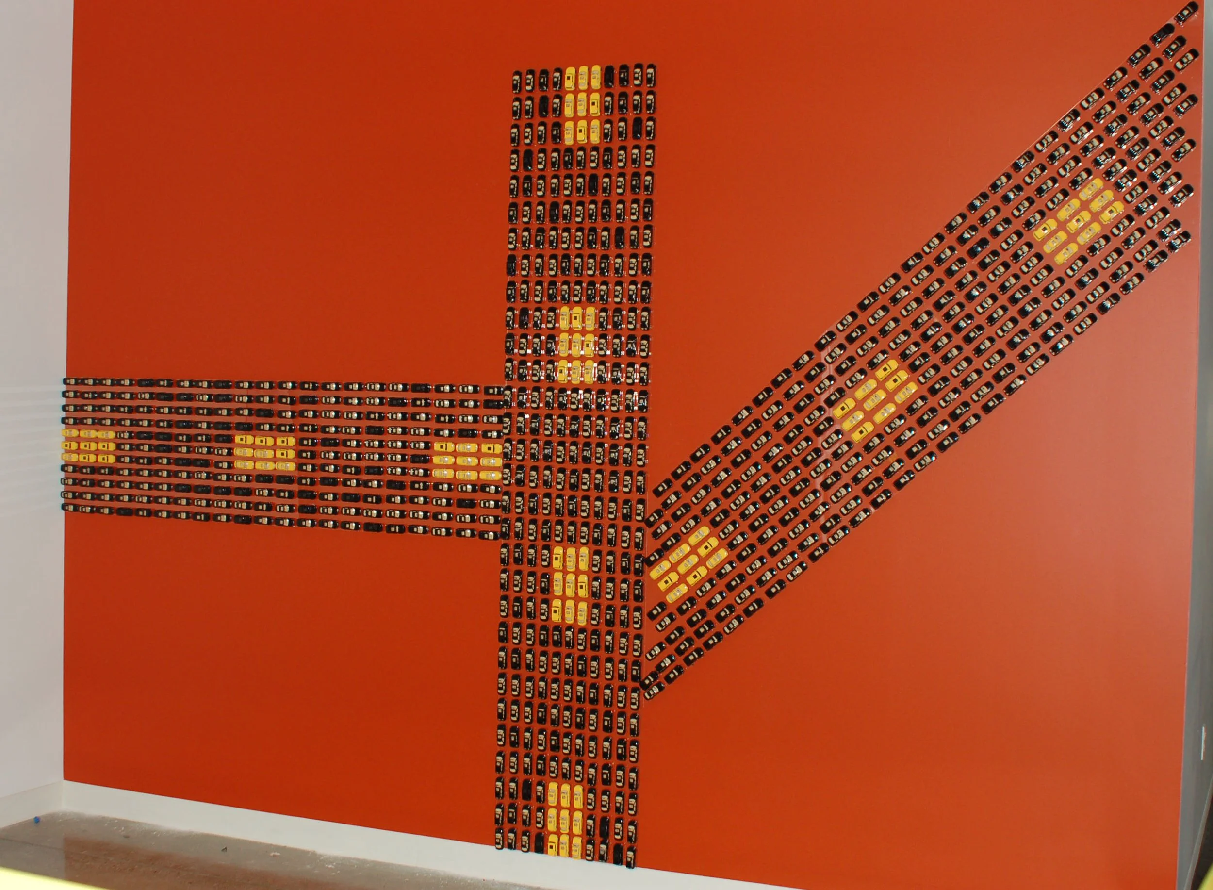 Custom dimensional feature signage installation adding texture and brand expression to commercial interior