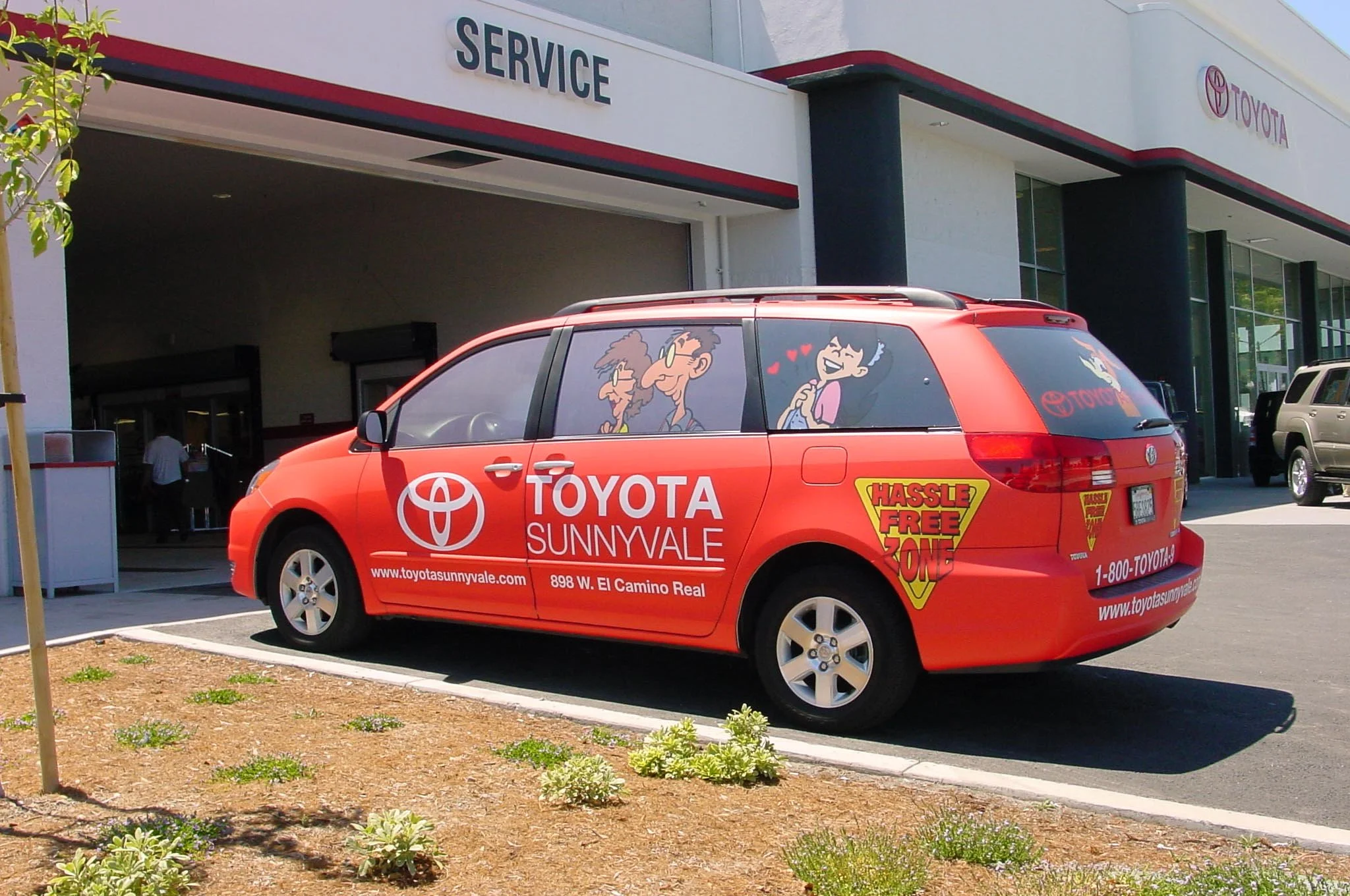 Toyota service vehicle wrap installed at dealership location for mobile brand visibility and advertising.