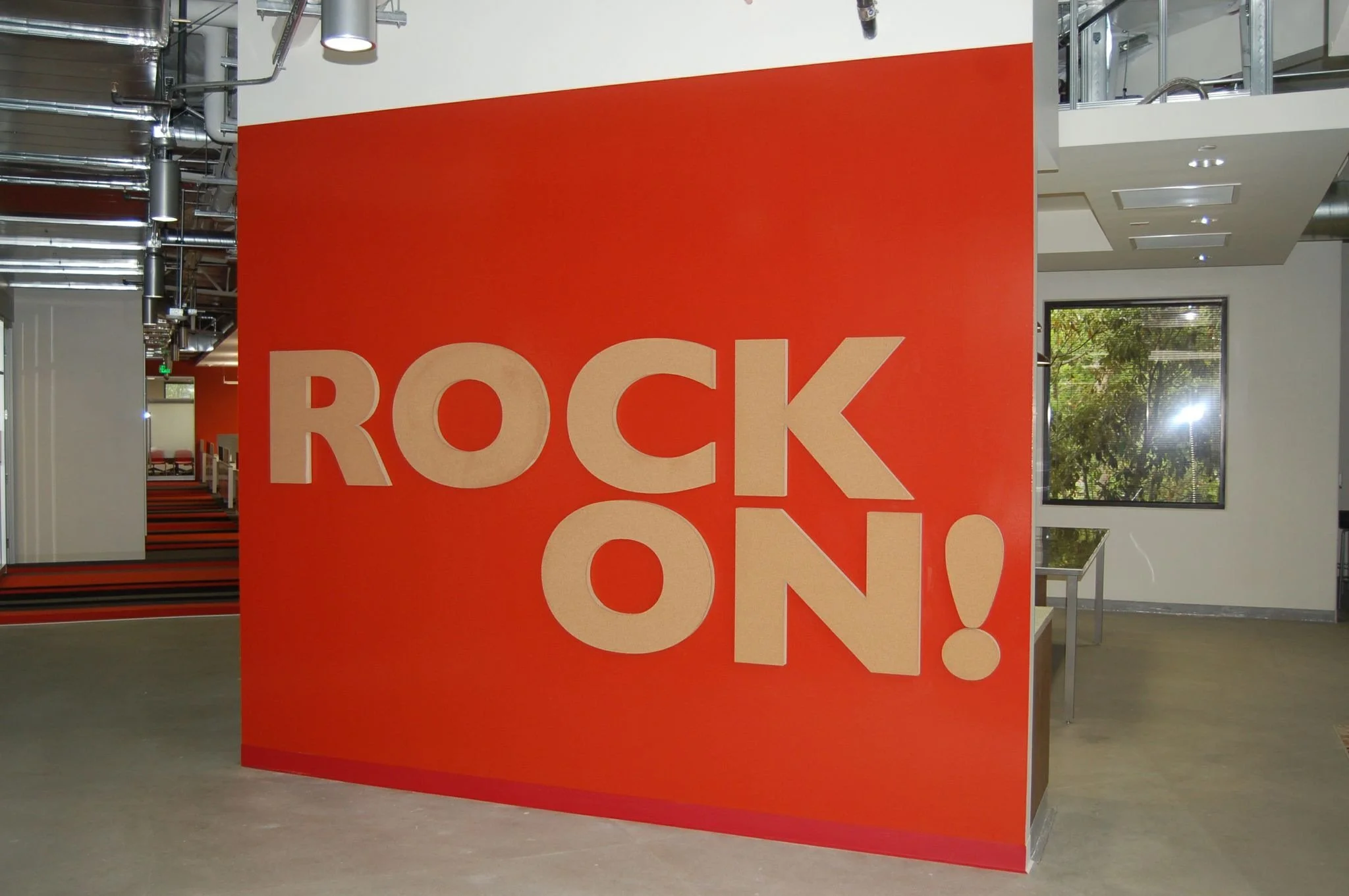 Custom promotional event signage featuring bold wall graphics to support branded activation