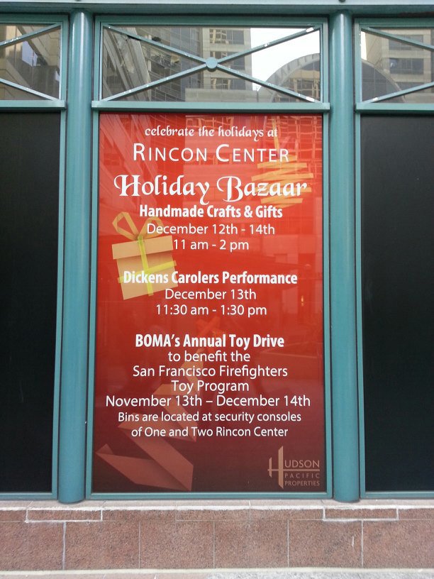 Branded storefront window graphic with custom vinyl window film for marketing display