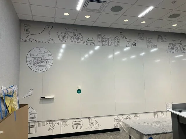 Full-room view of Pinterest San Francisco office with large-format environmental graphics and cohesive interior branding designed and installed by JP Digital.
