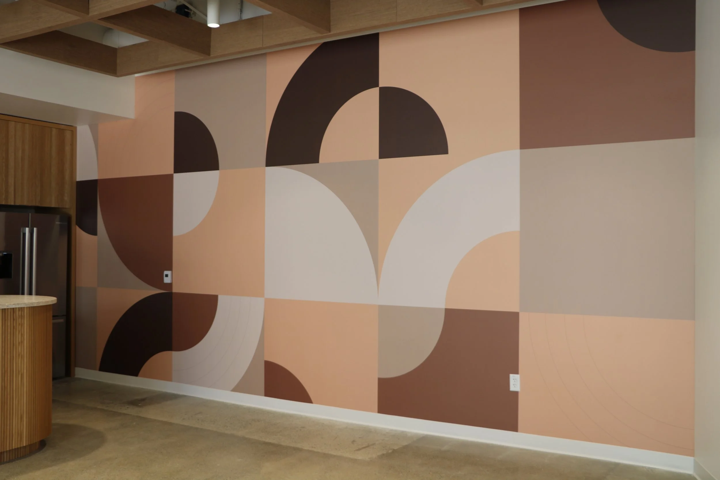 Close-up of textured wallcovering installed in commercial kitchen breakroom for durable and easy-to-maintain surfaces.