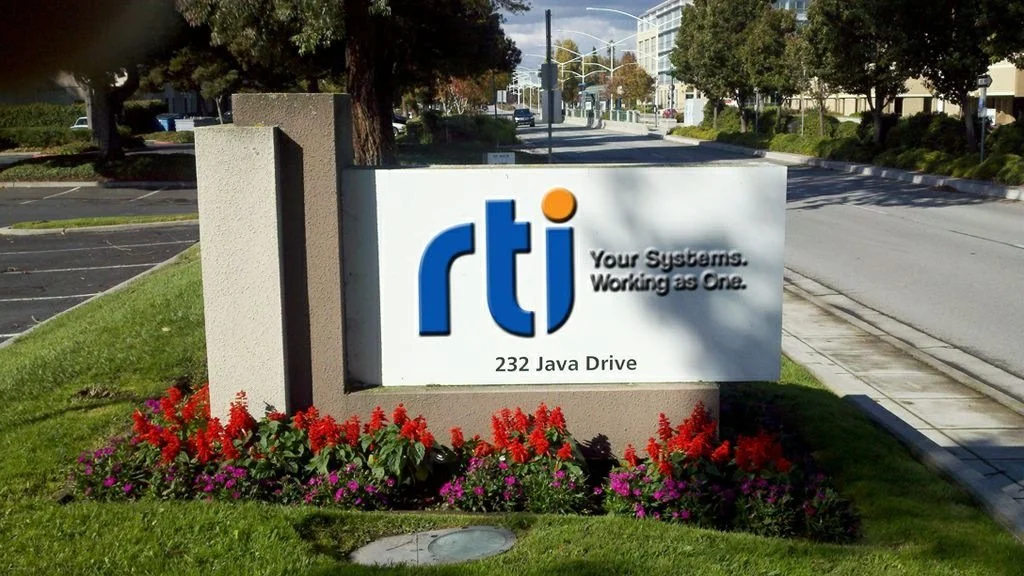 Exterior monument signage for RTI providing high-visibility business identification at property entrance