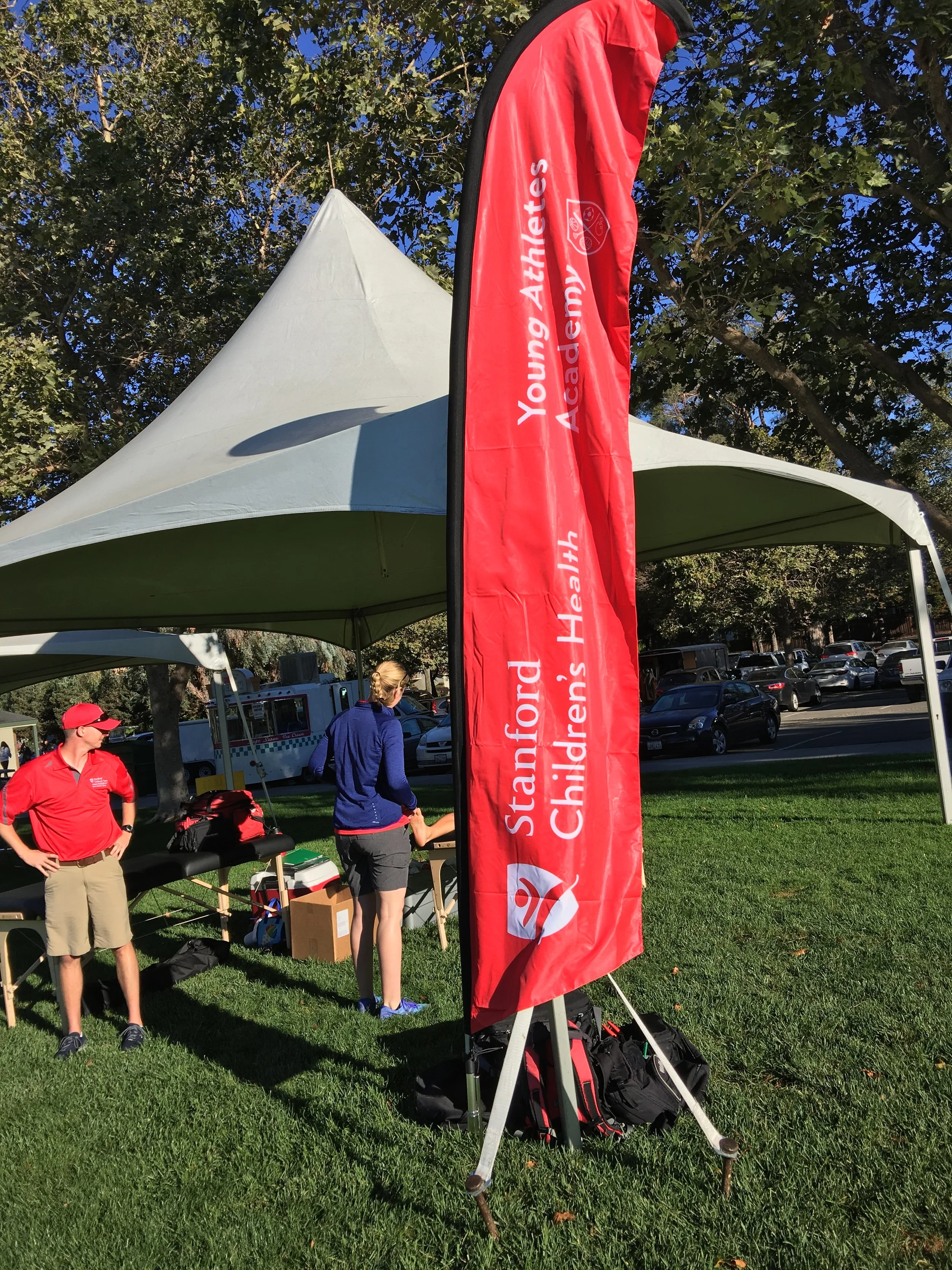 Custom feather flag designed for outdoor events and brand promotions.