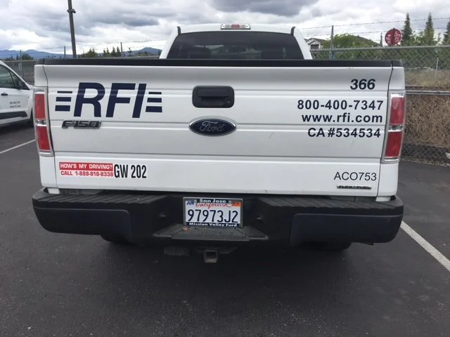 Commercial fleet truck wrap for RFI featuring company identification and DOT information