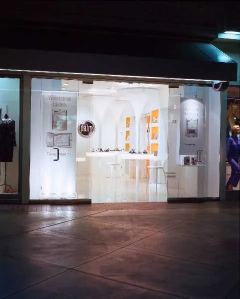 Custom retail-style trade show exhibit booth designed to create an interactive branded experience