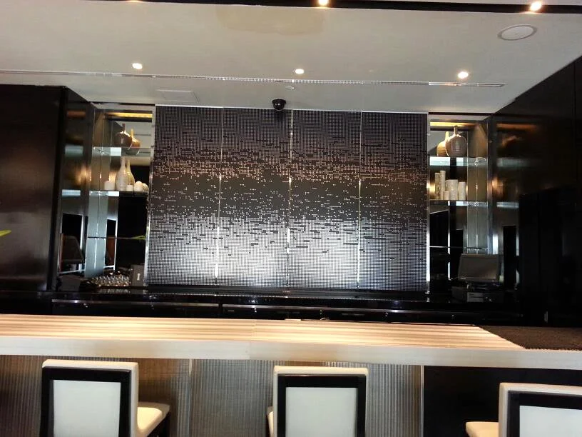 Custom decorative window film feature wall installed in corporate lobby