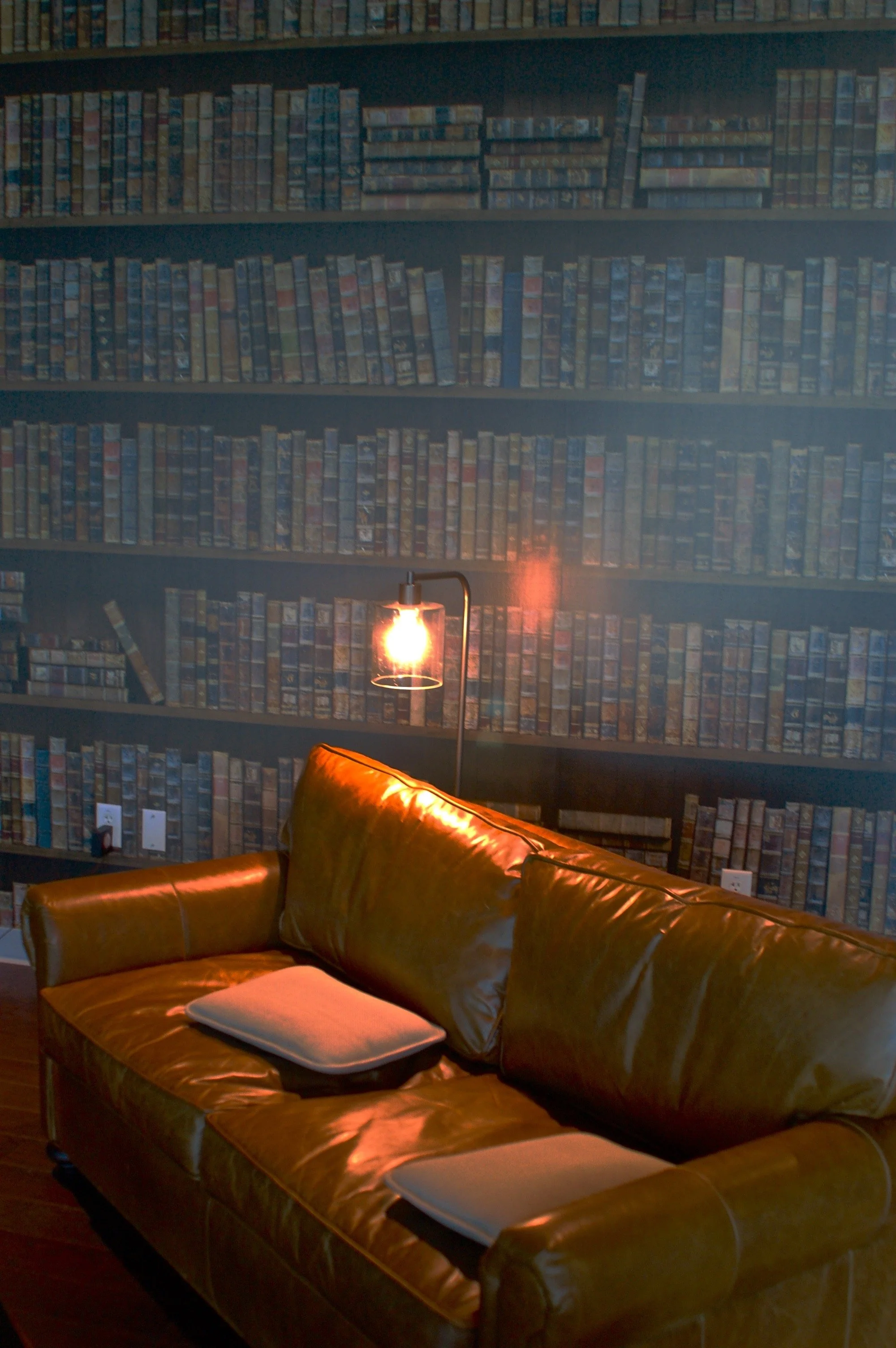 Custom pattern wallcovering installed in a lounge area to add texture, branding, and visual depth to the space.