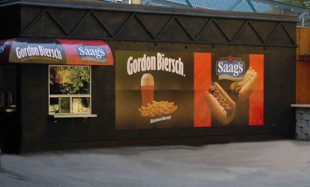 Custom retail window graphics promoting products and enhancing storefront visibility