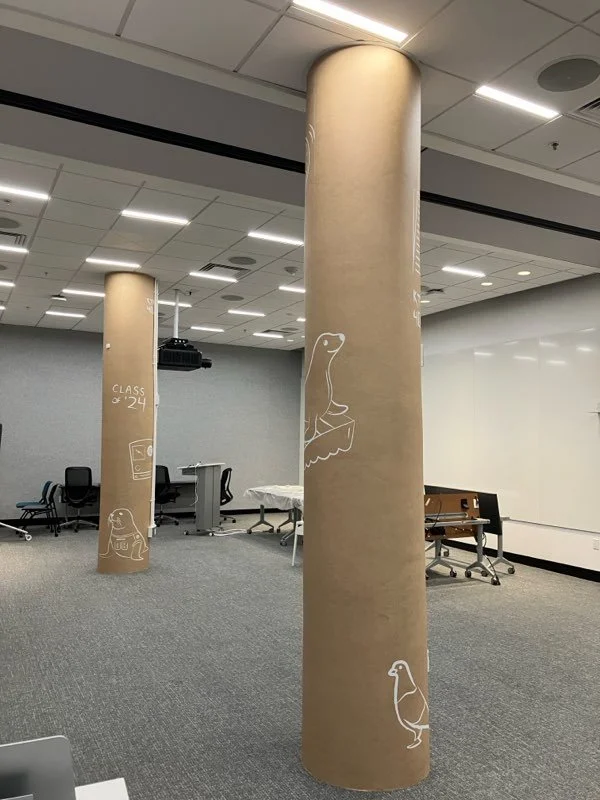 Pinterest San Francisco office featuring structural pole wrapped in custom icon-pattern wallcovering as part of branded environmental graphics installation by JP Digital.