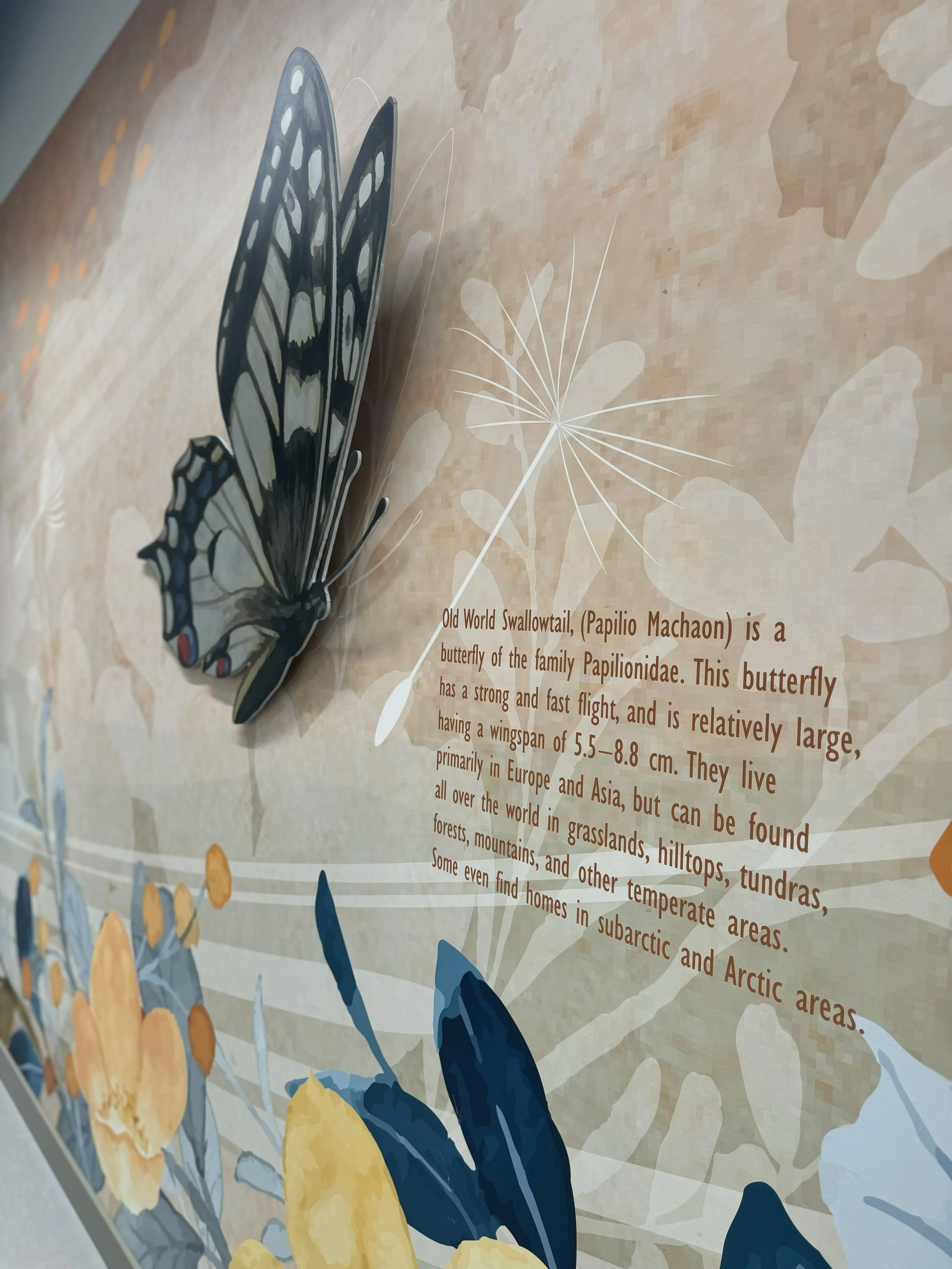 Detailed close-up of textured environmental graphics featuring layered artwork for immersive interior design.