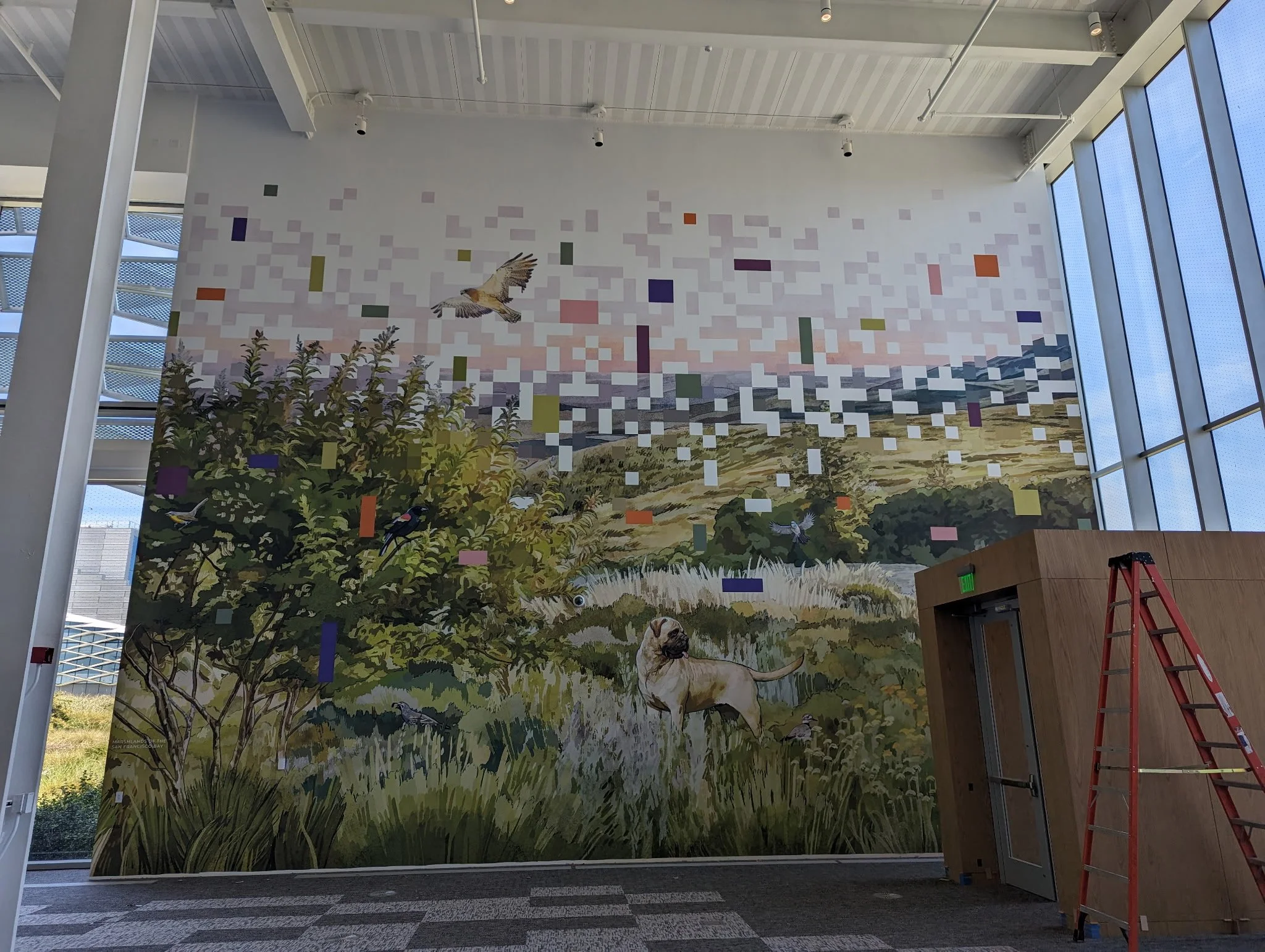 Large-scale landscape mural wallcovering creating an immersive nature-inspired office environment.
