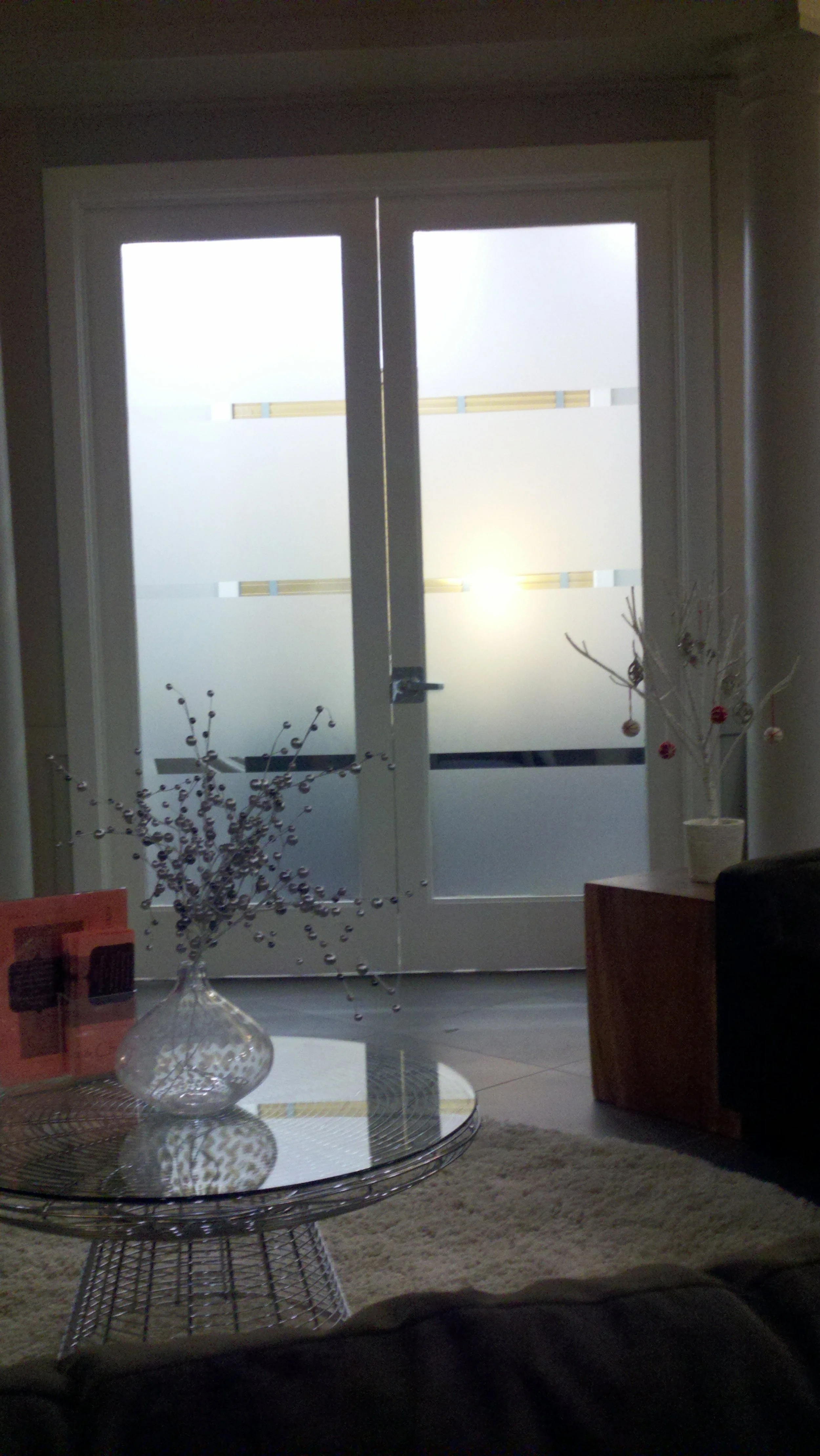 Minimal stripe privacy window film applied to tall interior office windows