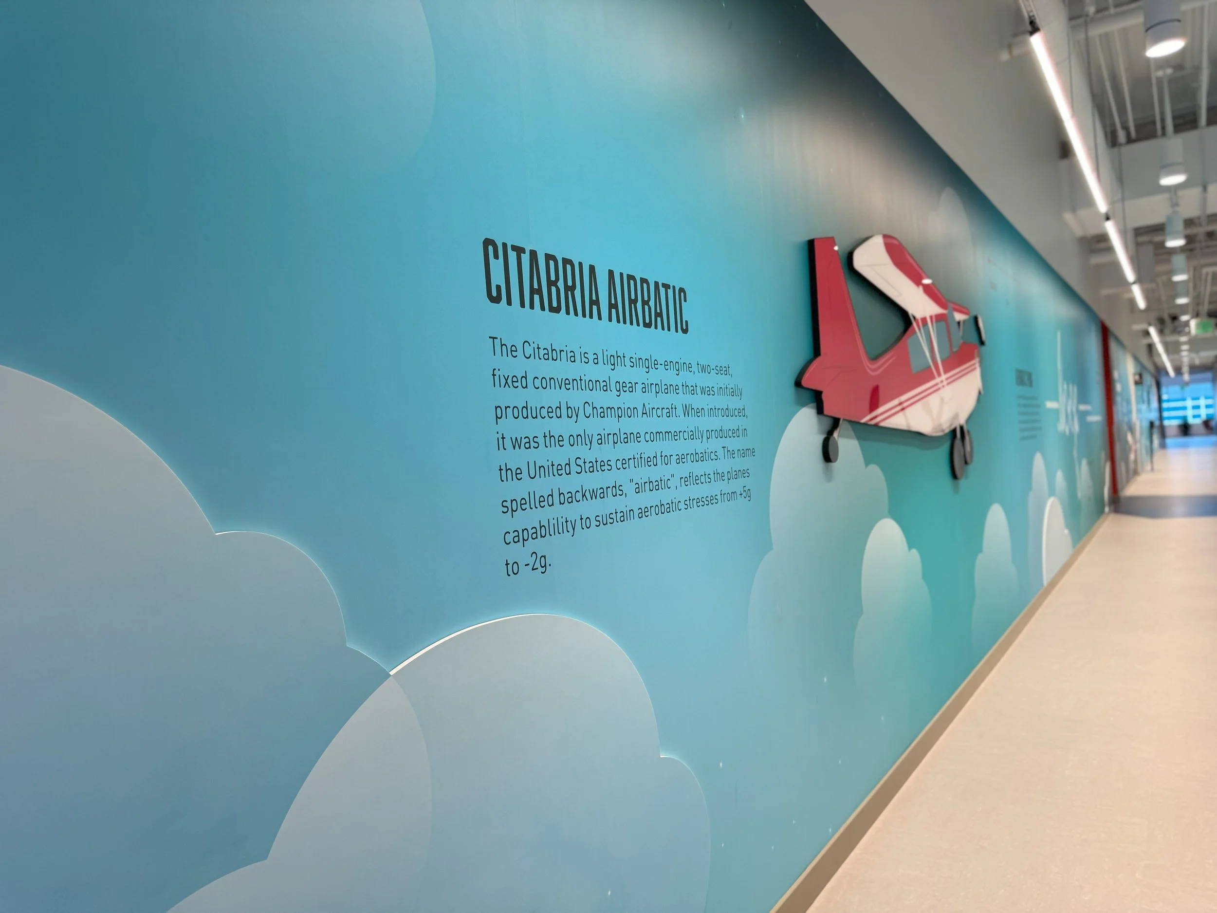 Motivational wall graphics with custom typography designed to enhance workplace culture and employee experience.