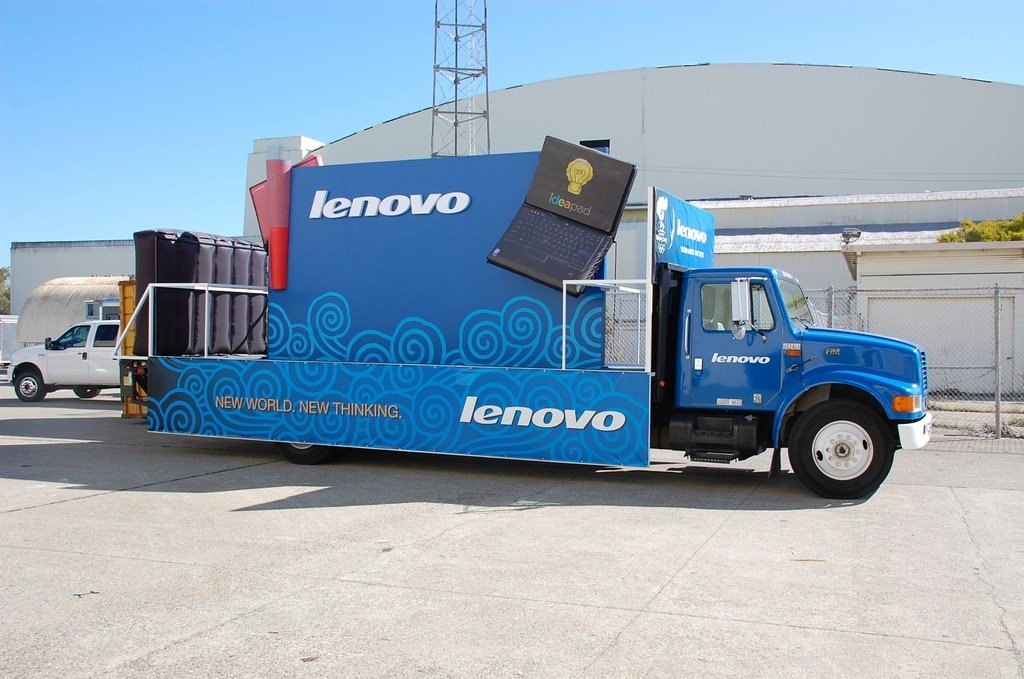 Custom box truck wrap with corporate branding and large-format fleet graphics