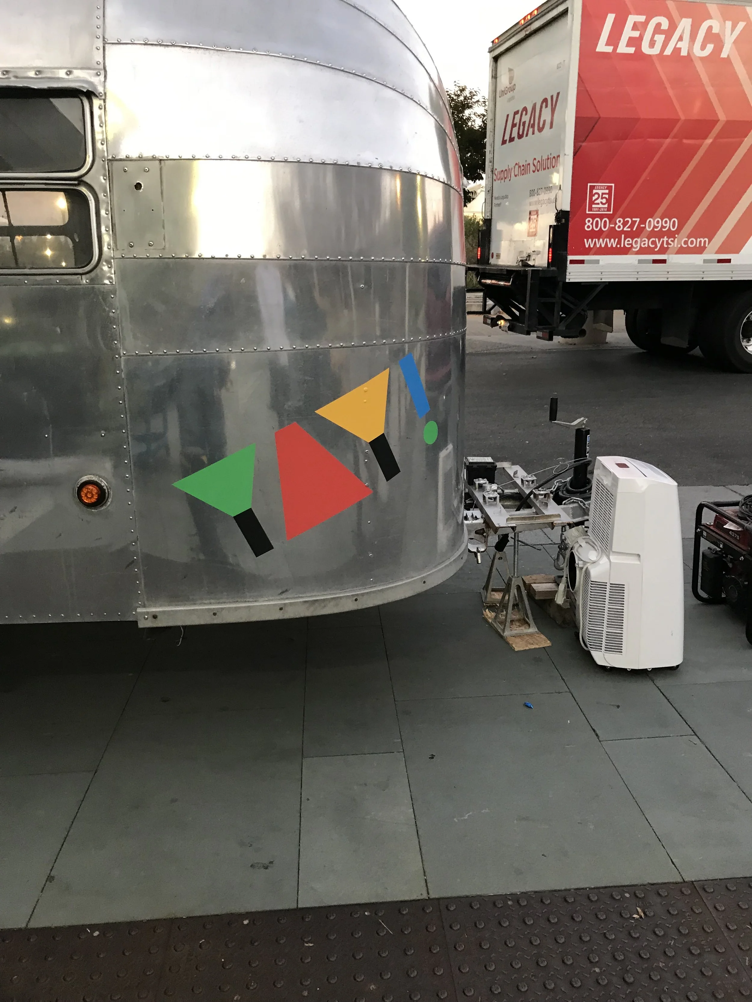 Custom trailer wrap with geometric color graphics for brand recognition