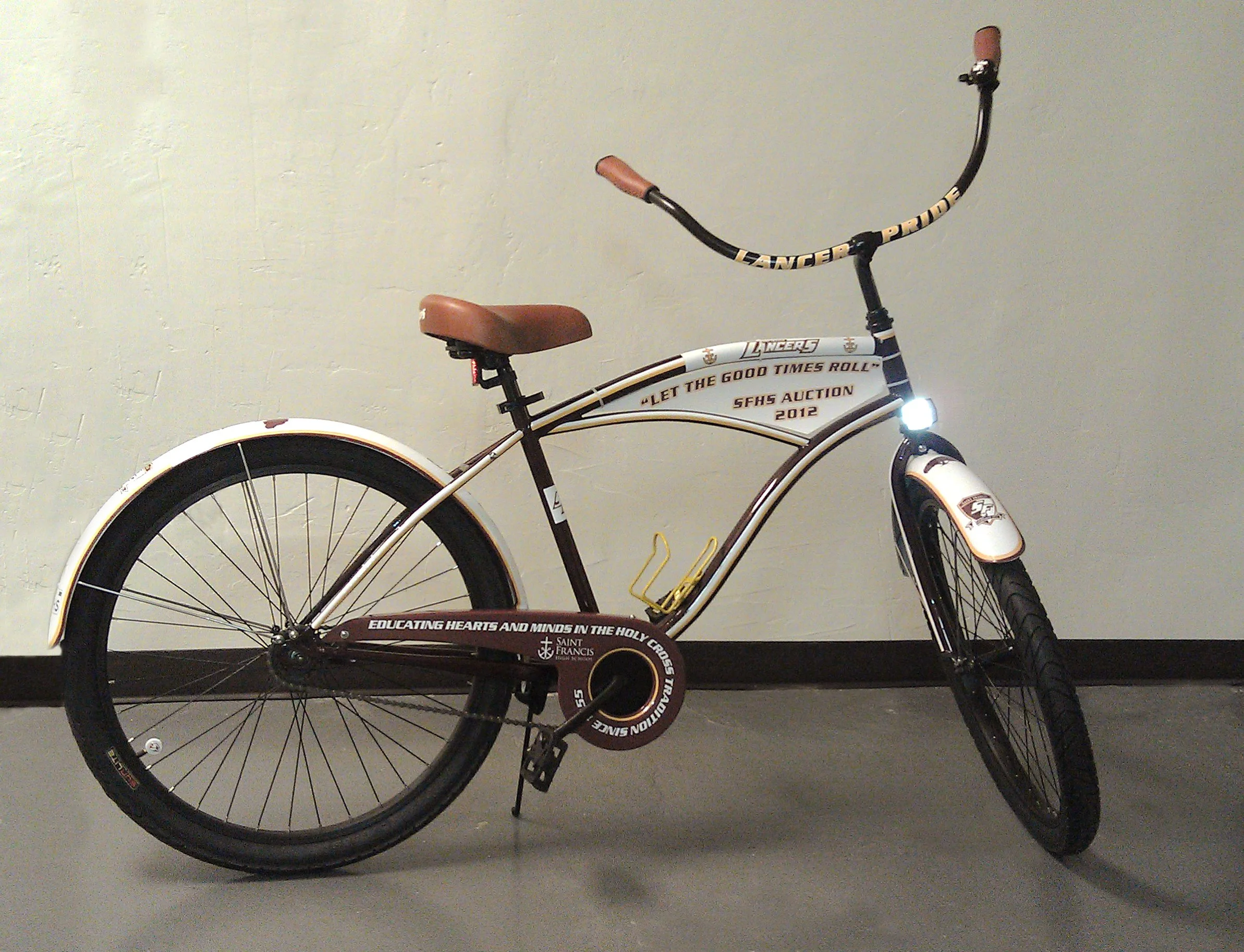 Custom branded bicycle wrap with company graphics applied to frame for promotional display and mobile brand visibility.