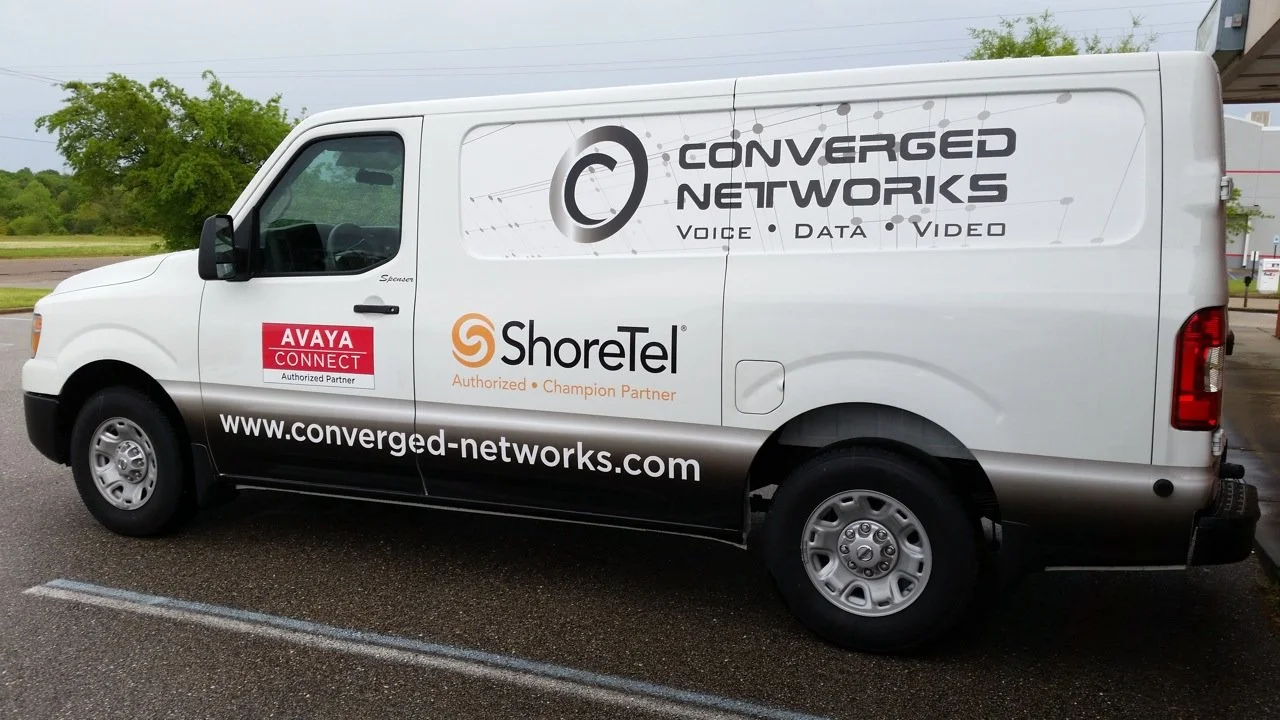 Fleet service van wrap with company logo, contact information, and clean branding