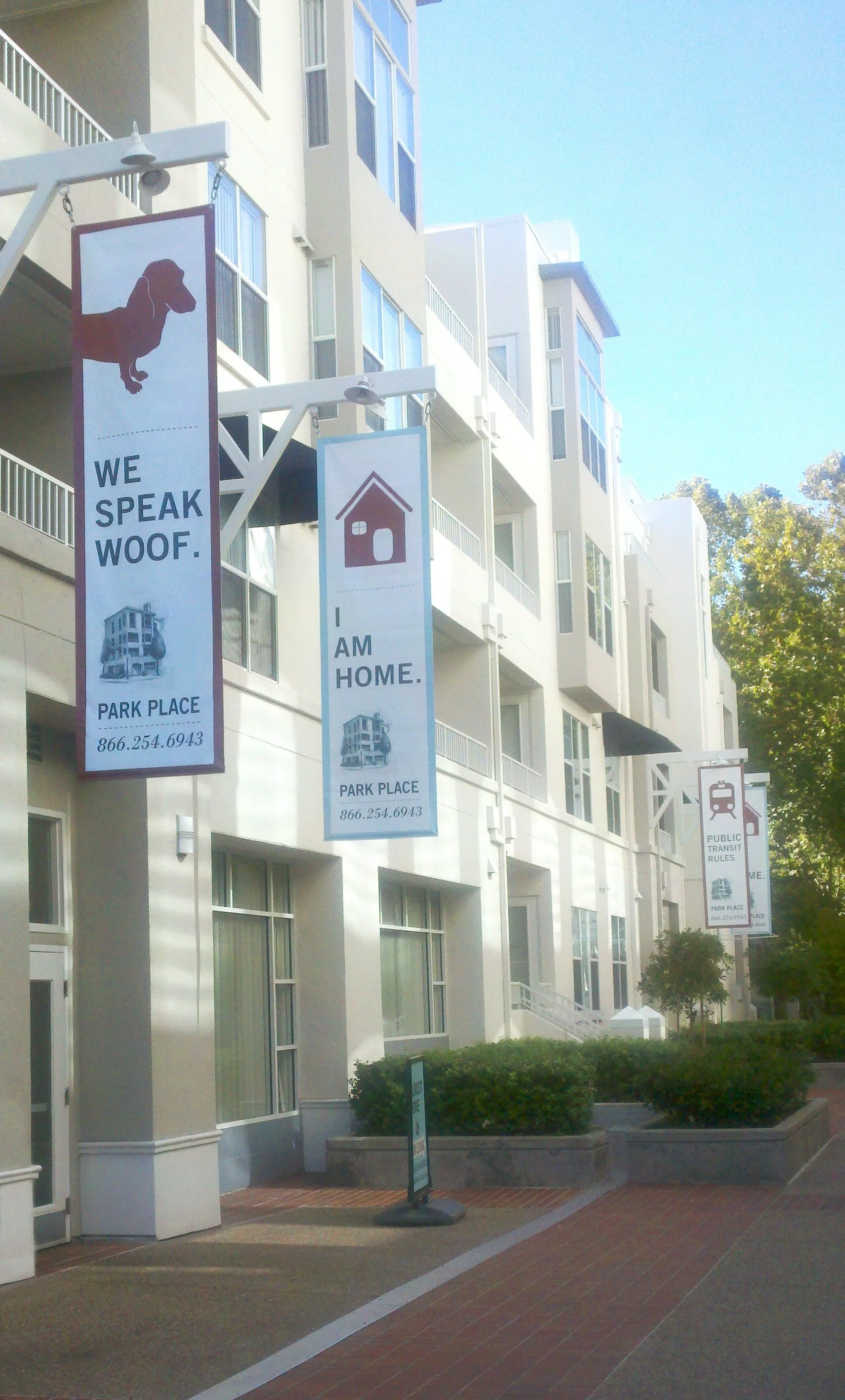 Vertical blade signage providing exterior wayfinding and tenant identification for commercial property
