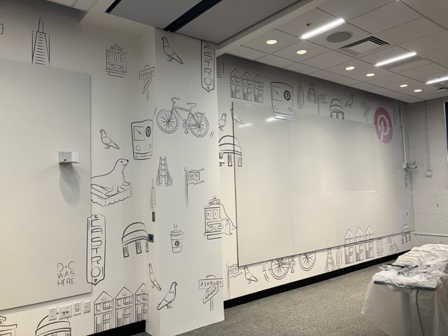 Pinterest San Francisco interior featuring custom environmental wall graphics and architectural linework, designed to enhance workplace branding and spatial identity by JP Digital.