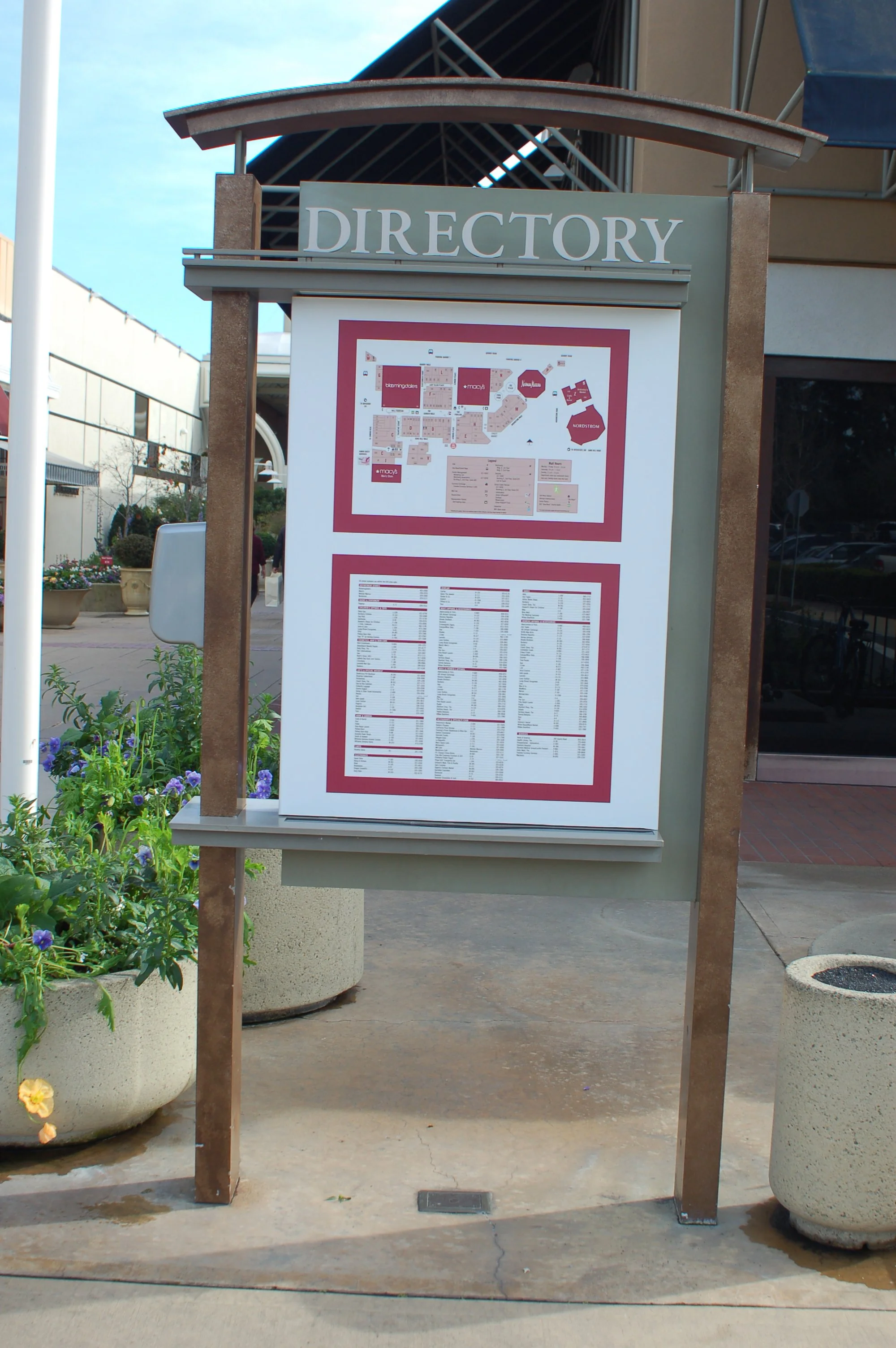 Outdoor directory signage displaying site information and navigation for visitors