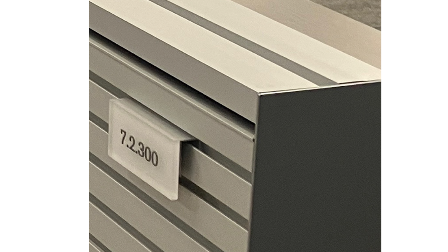 Installed ADA-compliant workstation identification sign with tactile lettering and braille at eBay Salt Lake City by JP Digital Imaging