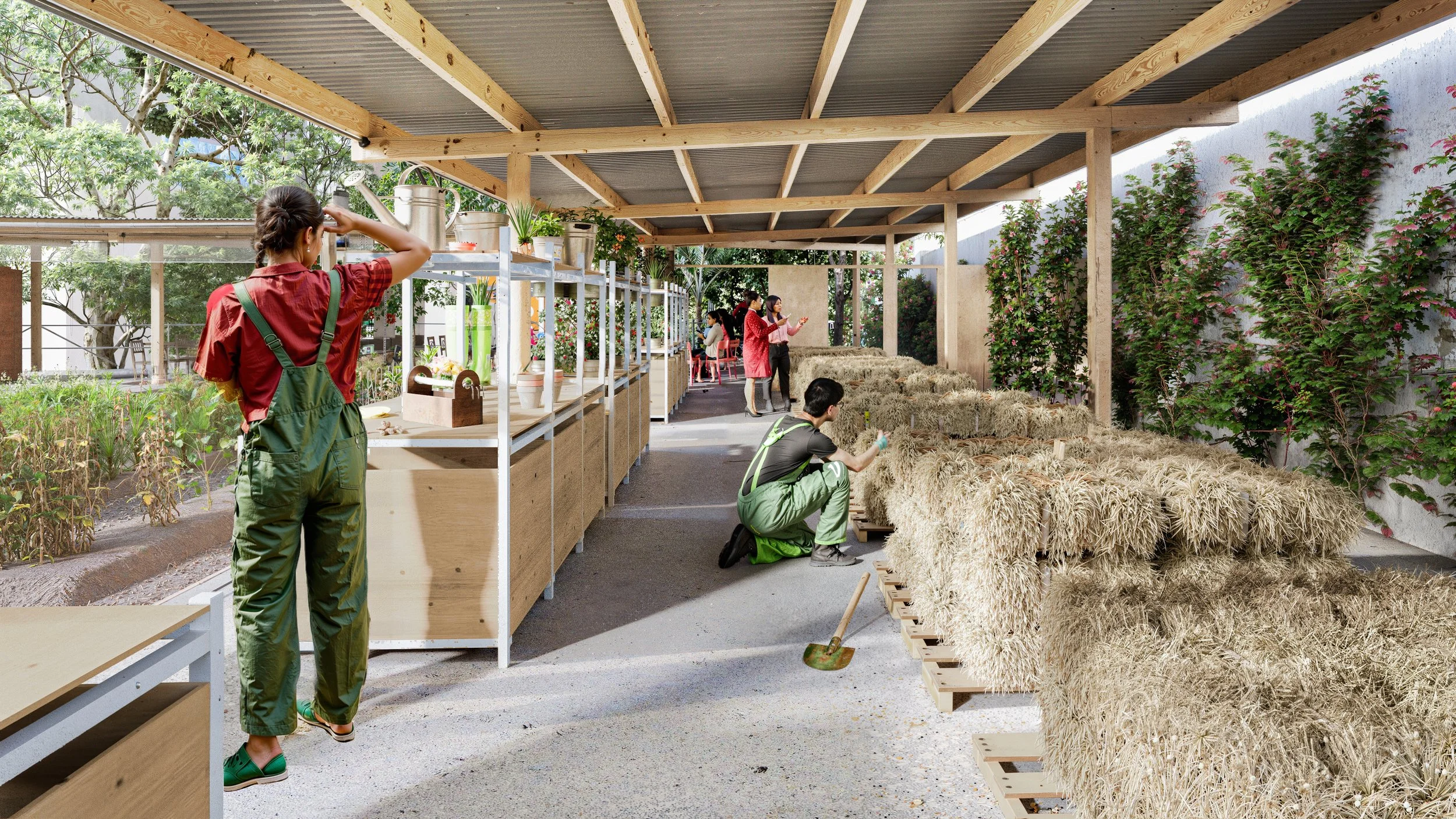 People working in a greenhouse or indoor plant nursery with shelves of plants and bundles of dried wheat or similar crops.