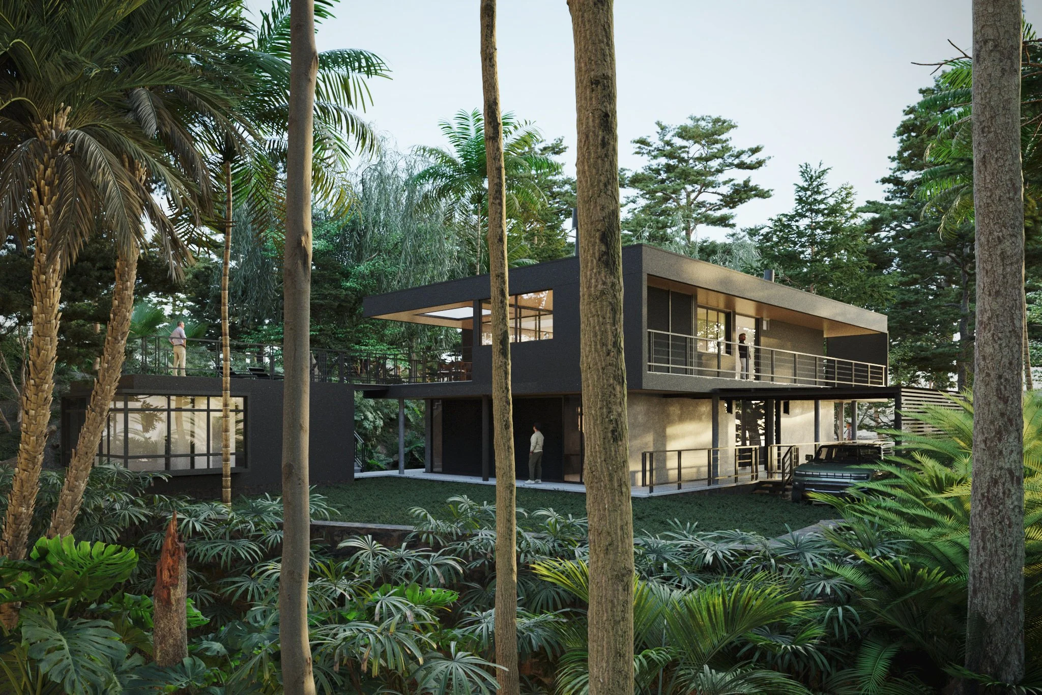 Modern two-story house on a hillside surrounded by lush green tropical trees, with people standing on the balcony and near the entrance, and a black vehicle parked underneath.