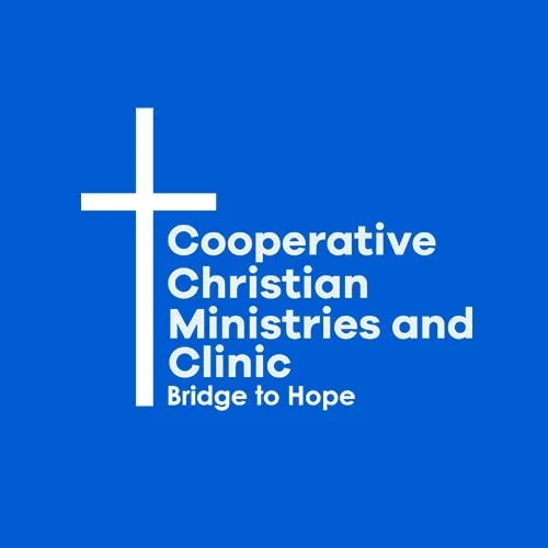 Logo for Cooperative Christian Ministries and Clinic with a cross and the tagline 'Bridge to Hope' on a blue background.