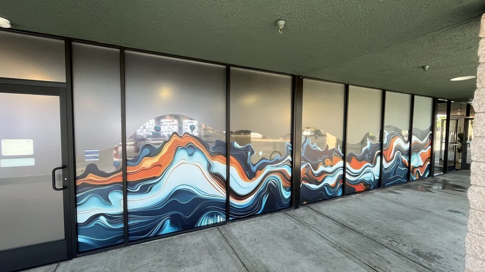 Printed graphics across a row of windows
