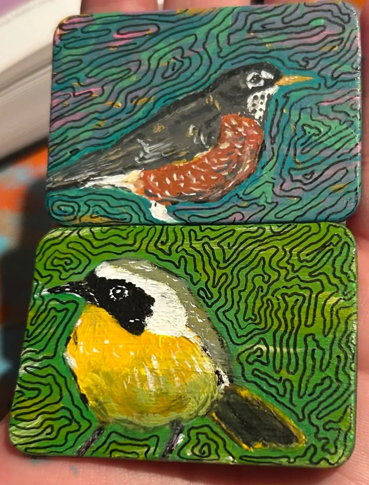 American Robin and Common Yellowthroat, 2025 acrylic on upcycled magnets