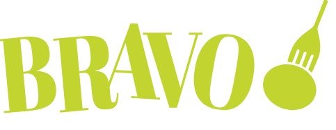 From above hands of unrecognizable woman rubbing aromatic spices into piece of raw meat over parchment paper