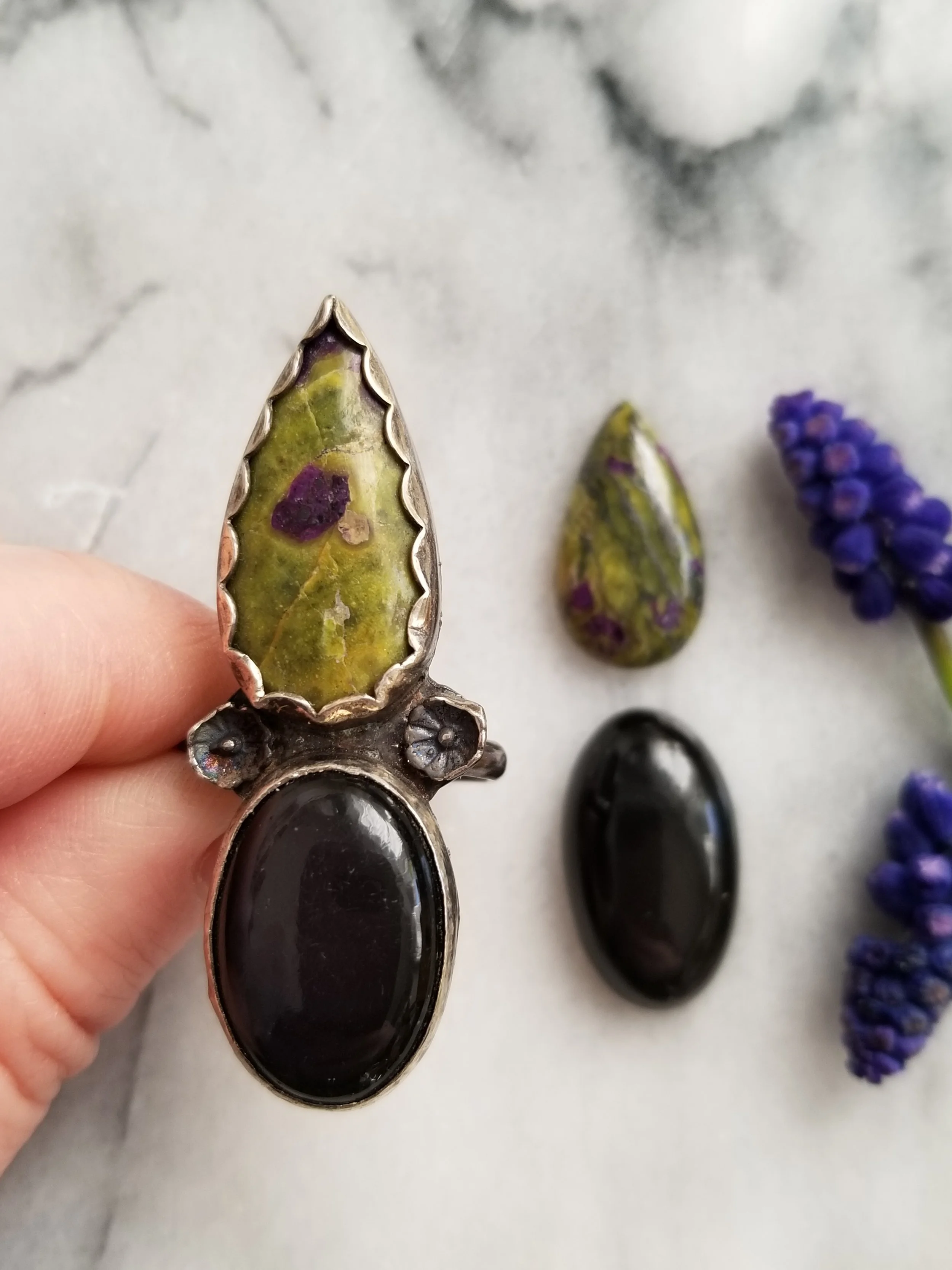 Custom made ring with Atlanticsite and obsidian
