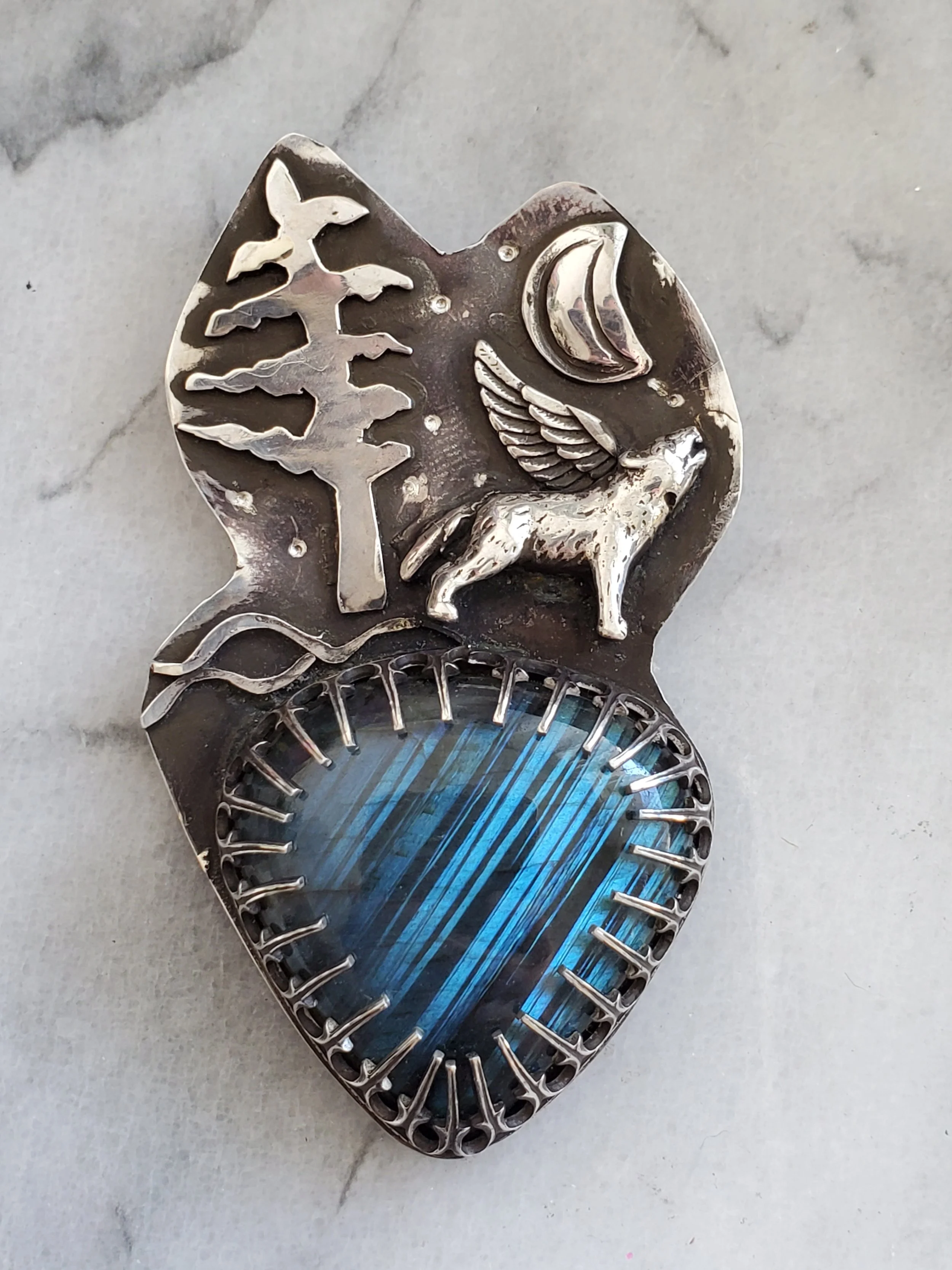 Custom made Takaya wolf pendant