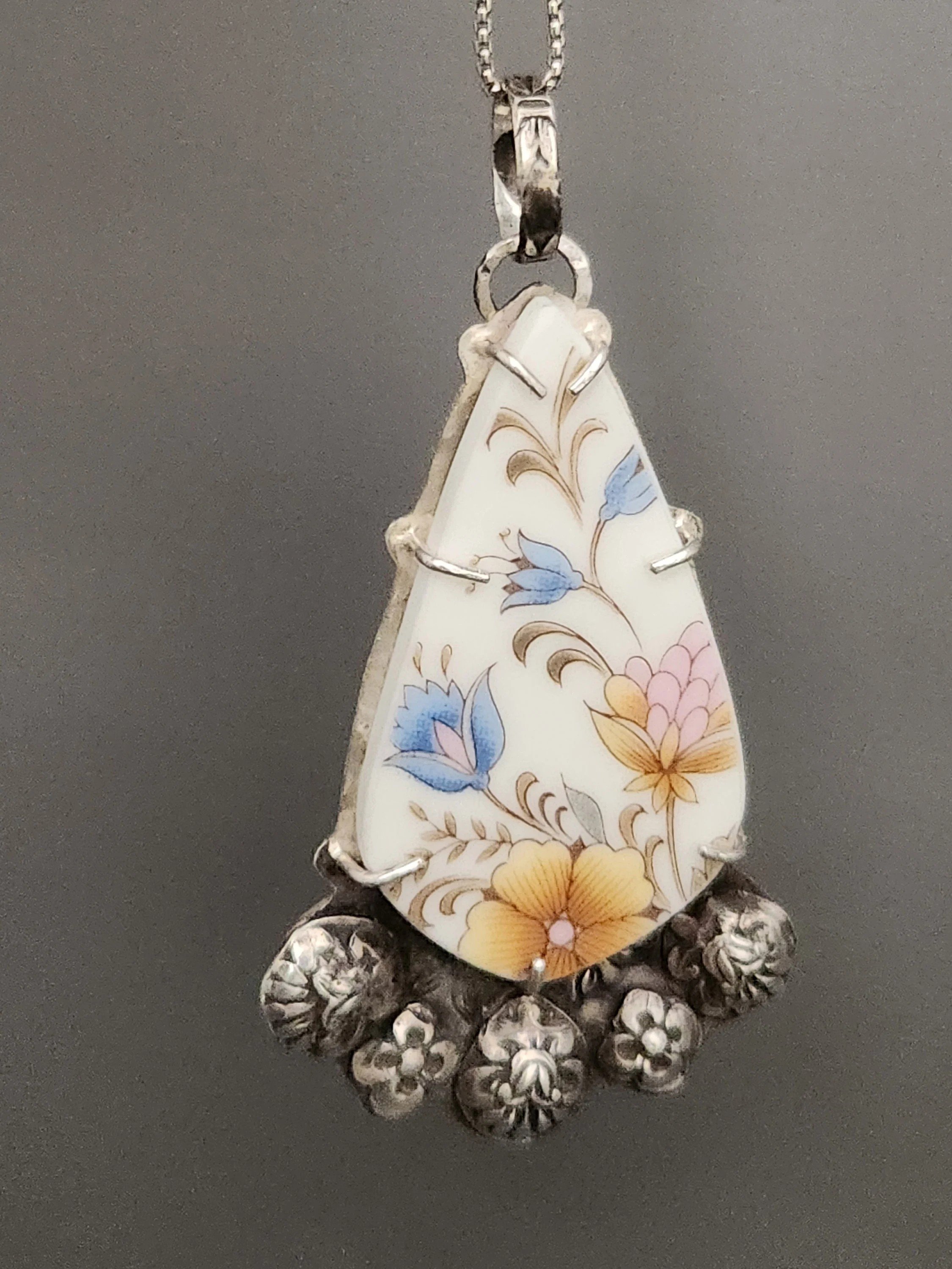 Solidarity with Ukraine upcycled china pendant in silver 3.jpg