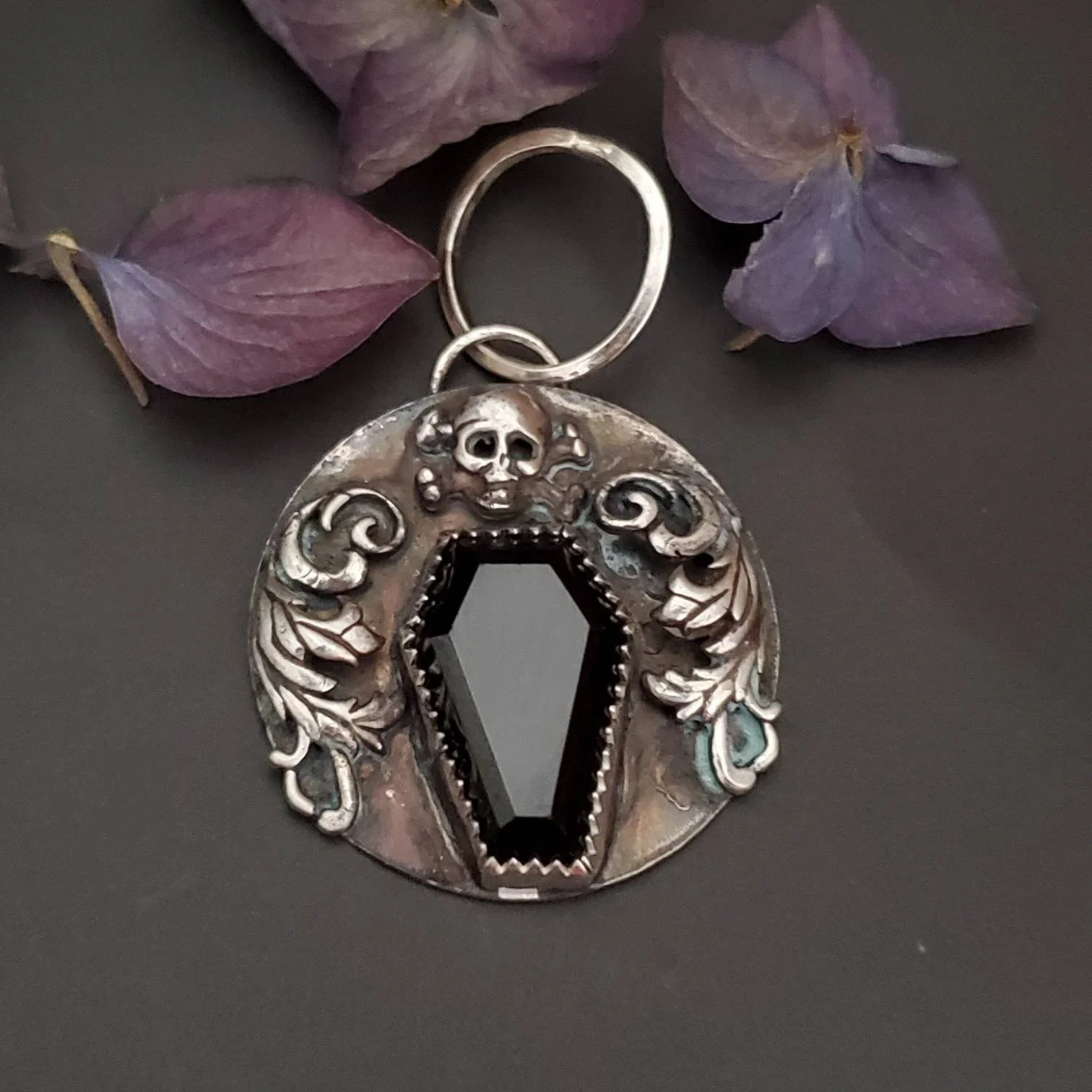 Black Spinel Coffin with Swirls and Skull Silver Pendant