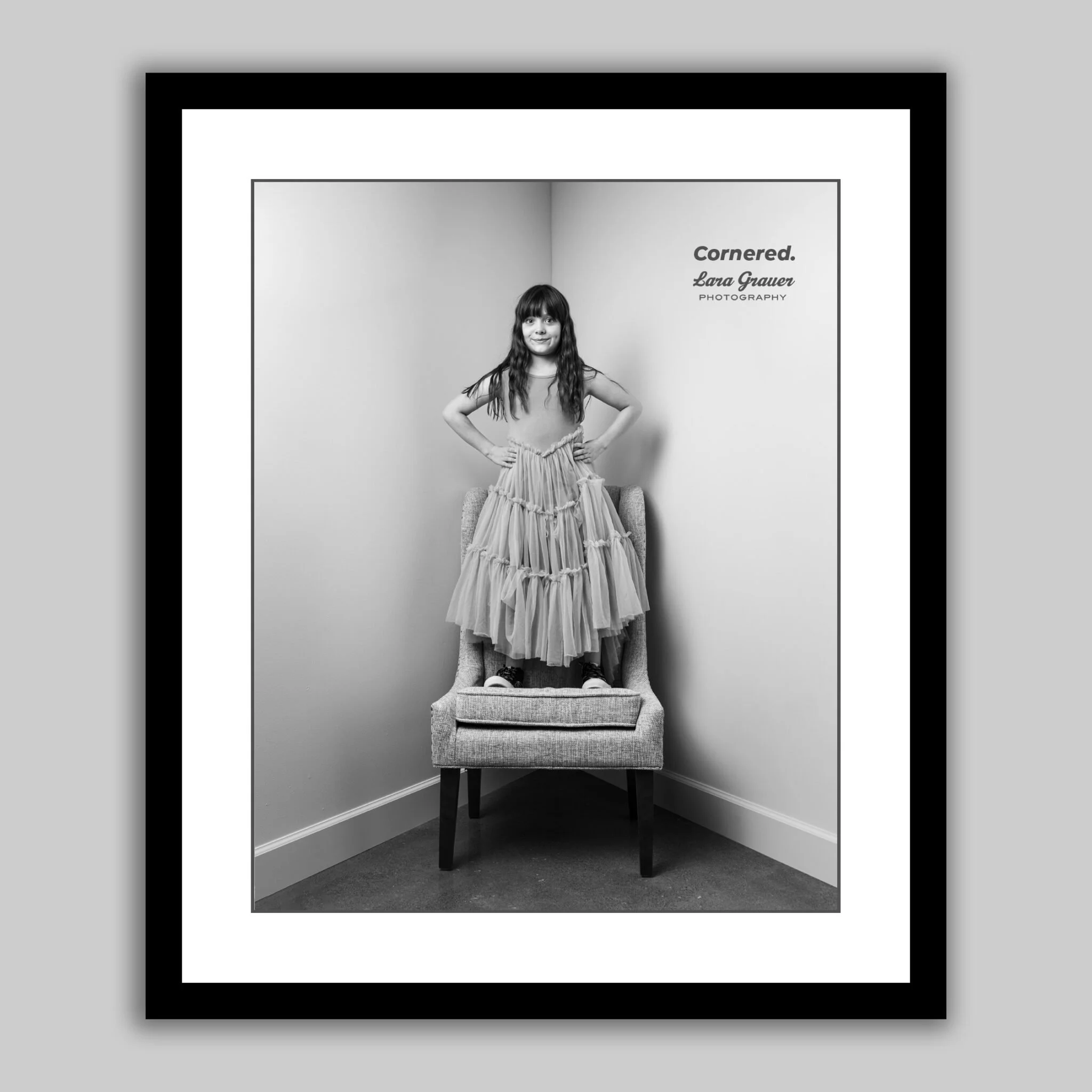 Cari is a spunky girl! She is full of enthusiasm and loves to perform for the camera. When her mom heard about our corner project, she knew right away that Cari would want in! I love her frilly dress and her expressive eyes. They bring a unique energ