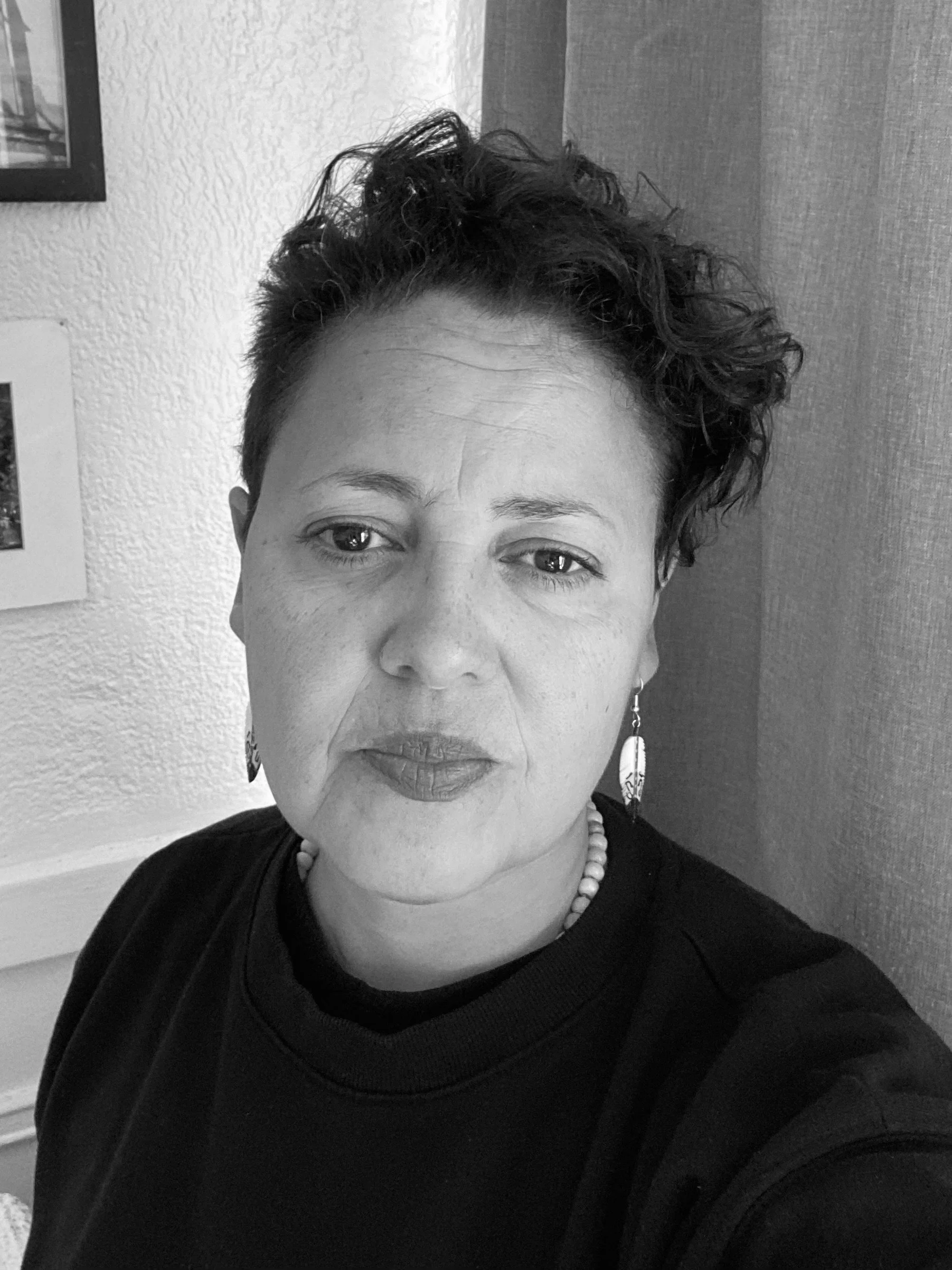 Somatic coach guiding a woman through nervous system awareness and embodied practices