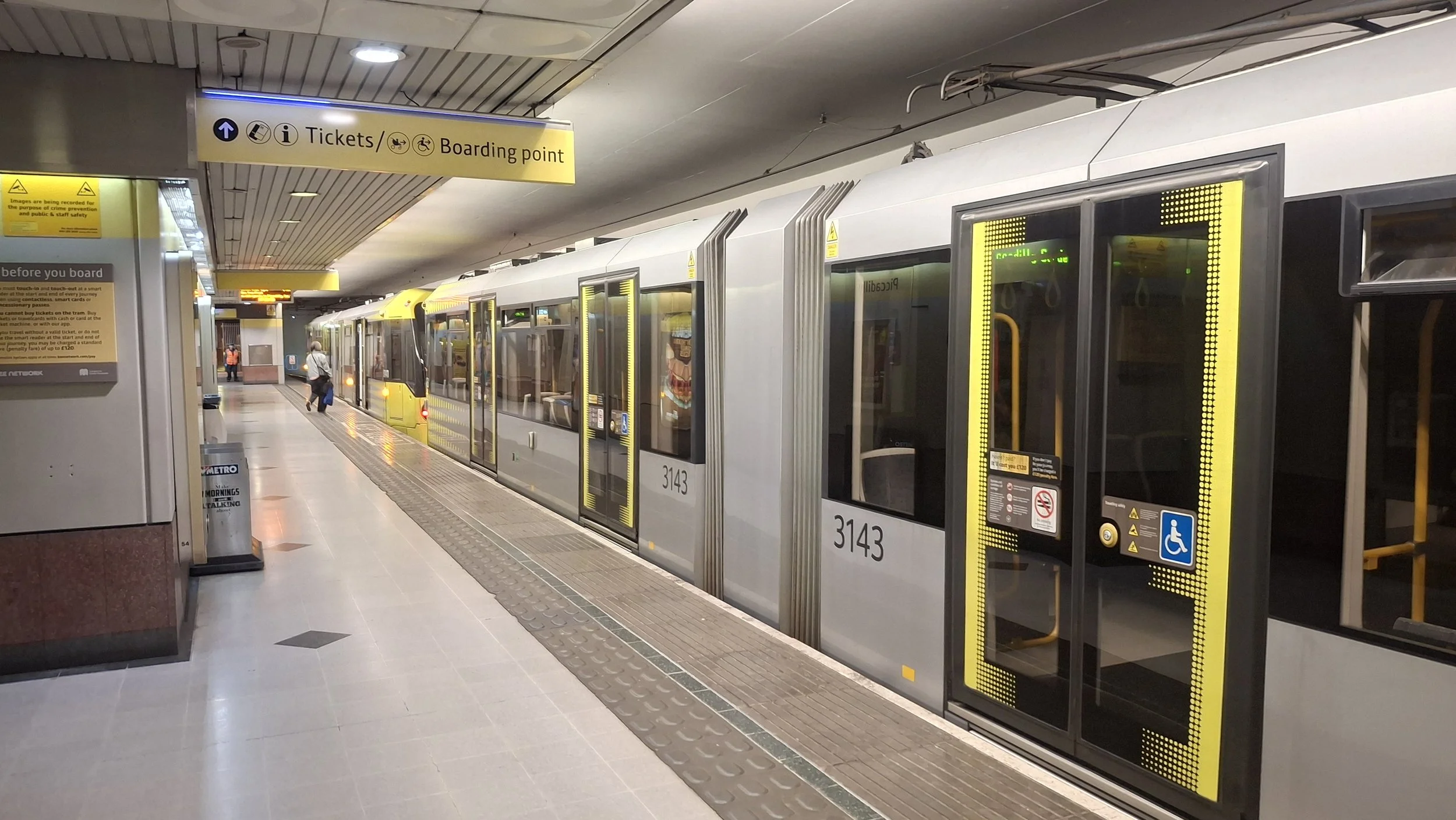 Tram 3143 out of service with the lights off with another in-service tram ahead of it at Piccadilly Platform B, 28 September 2026.