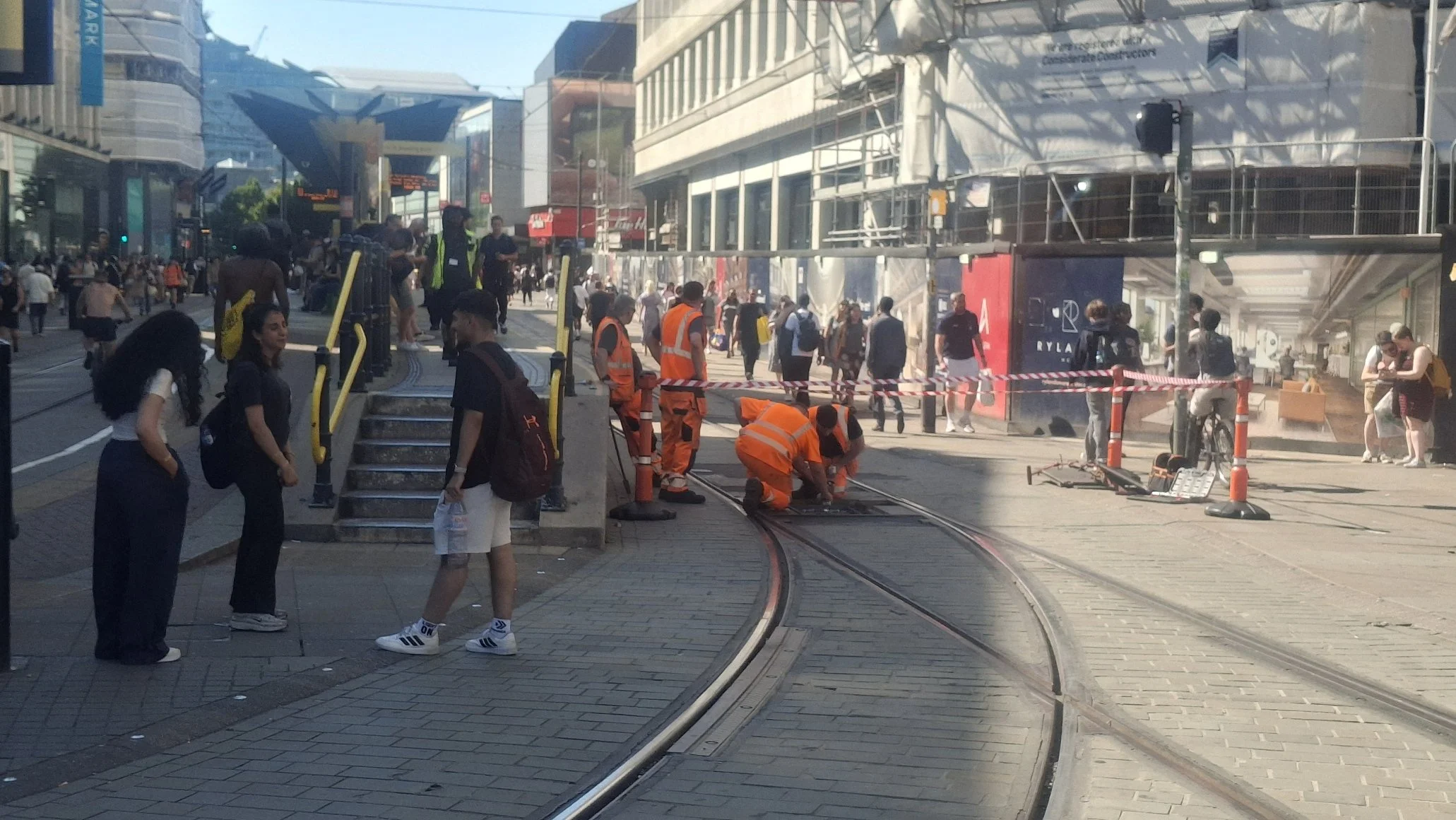 Workers on points at Market Street Metrolink, 9 July 2026.