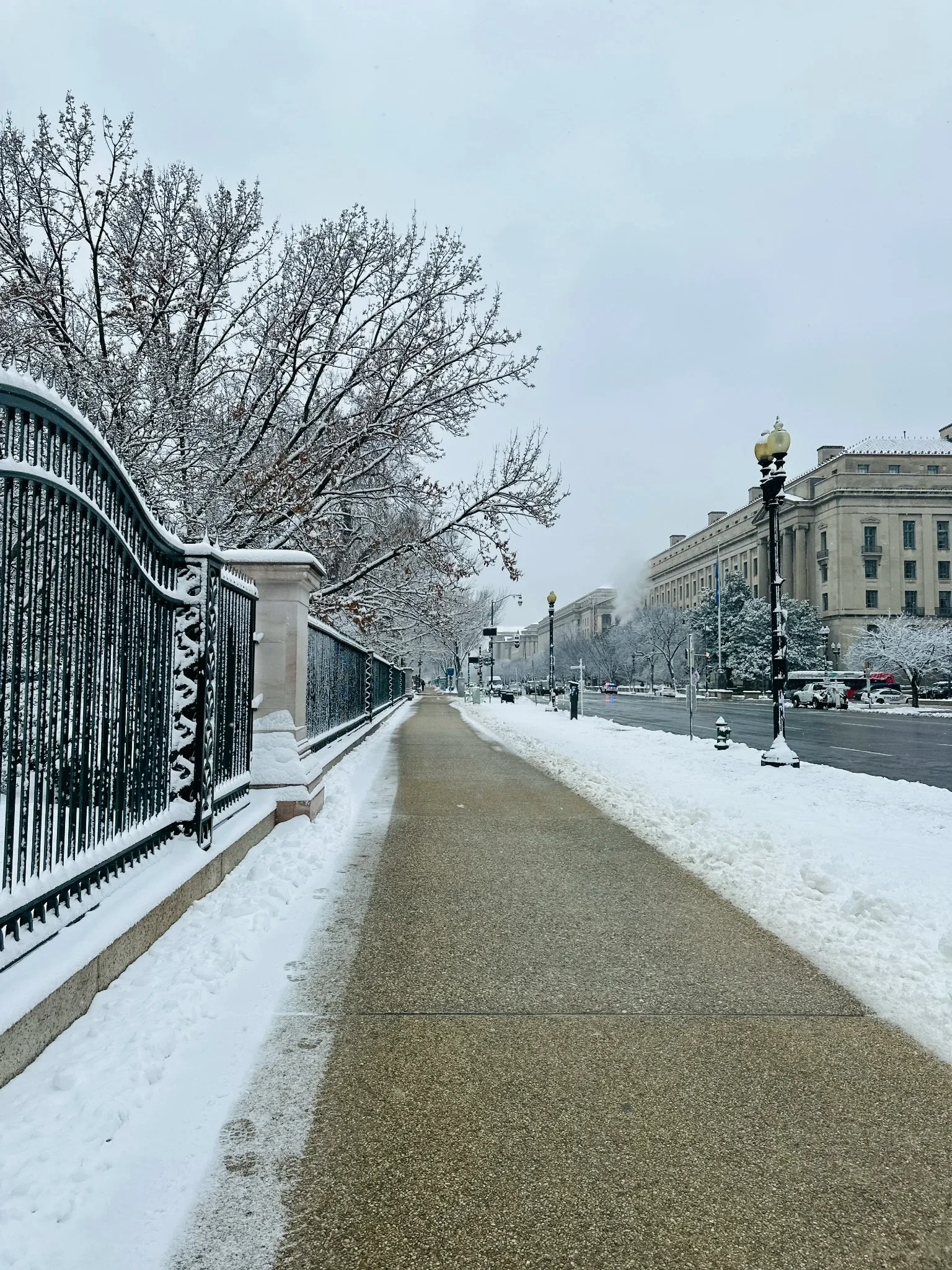 Professionally cleared city sidewalk showcasing reliable snow removal and pedestrian safety during winter conditions in Calgary.