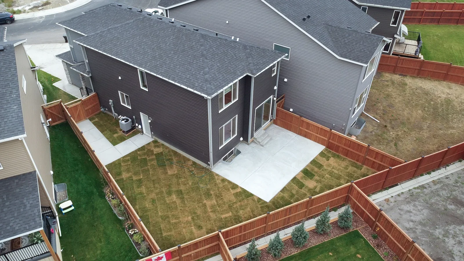 Concrete backyard patio project completed in Calgary.