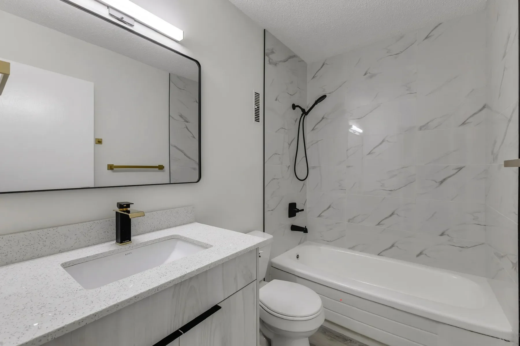 Modern bathroom renovation in Calgary with tile shower and vanity