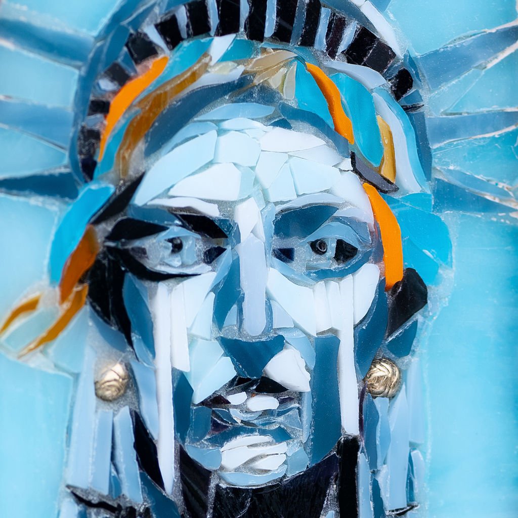 Colorful mosaic art of a human face with tears against a blue background.